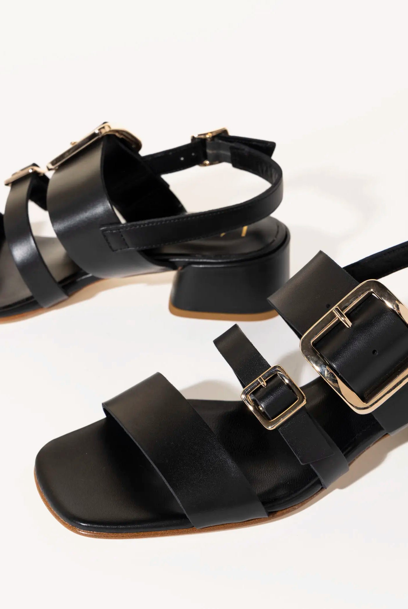 swatch_black leather heeled buckle sandal heeled sandals