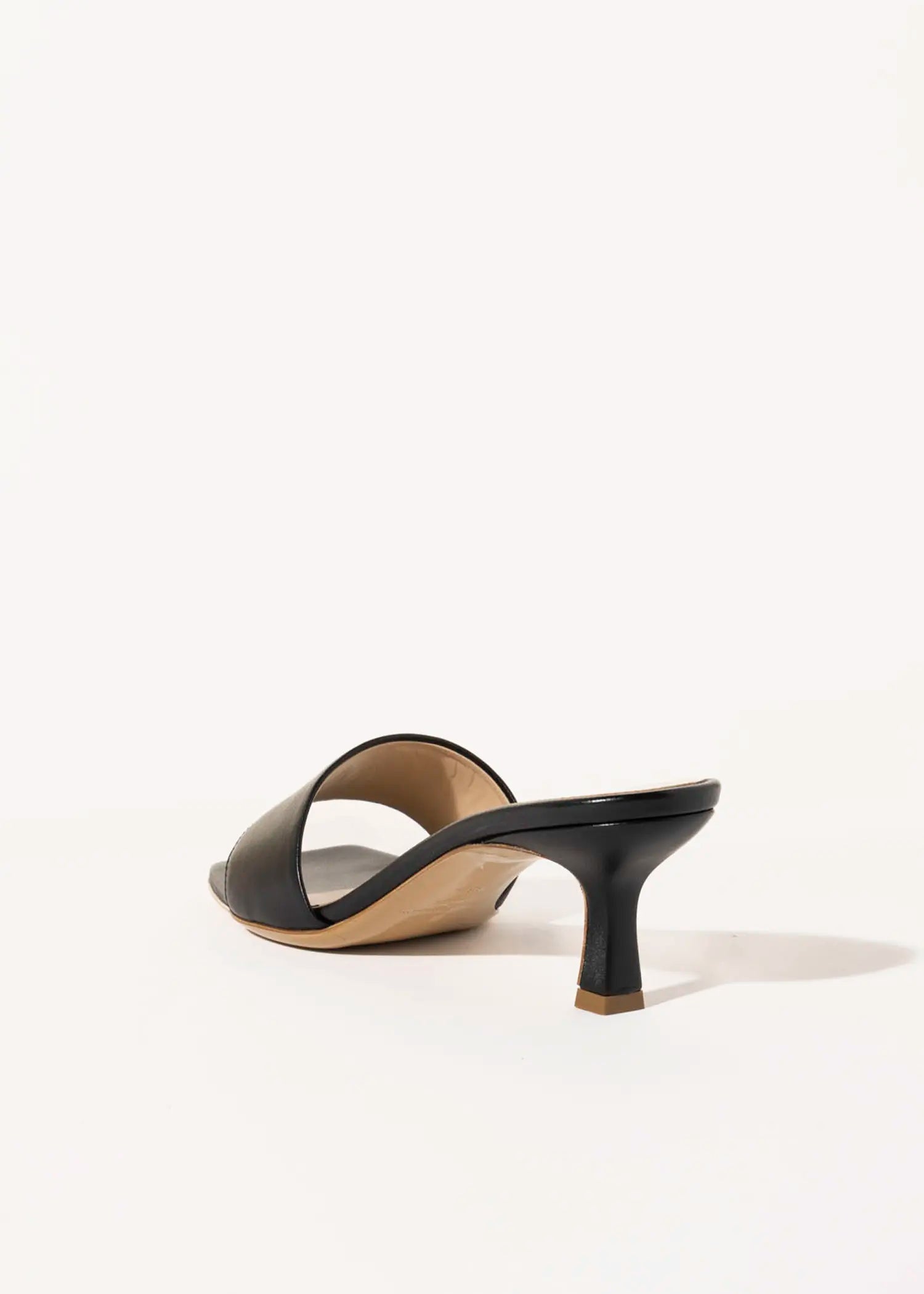 swatch_black leather slide sandal heeled sandals