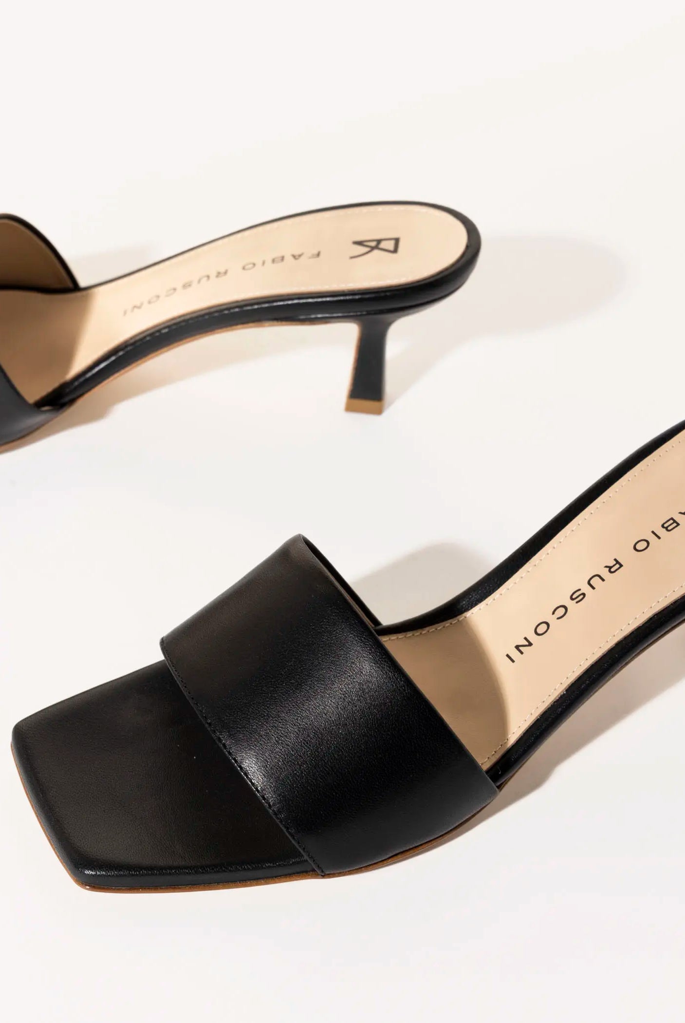 swatch_black leather slide sandal heeled sandals