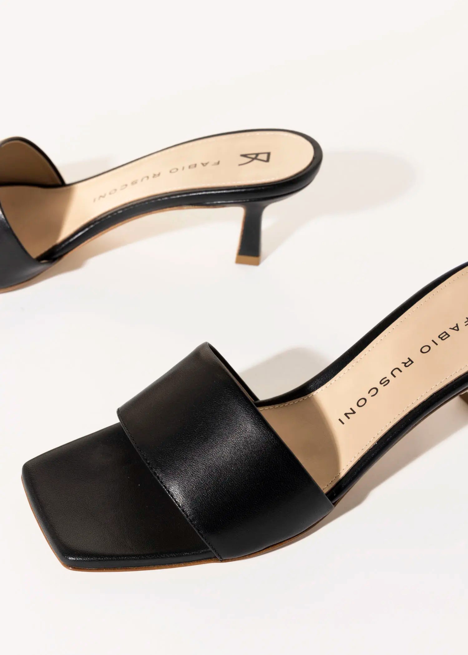 swatch_black leather slide sandal heeled sandals