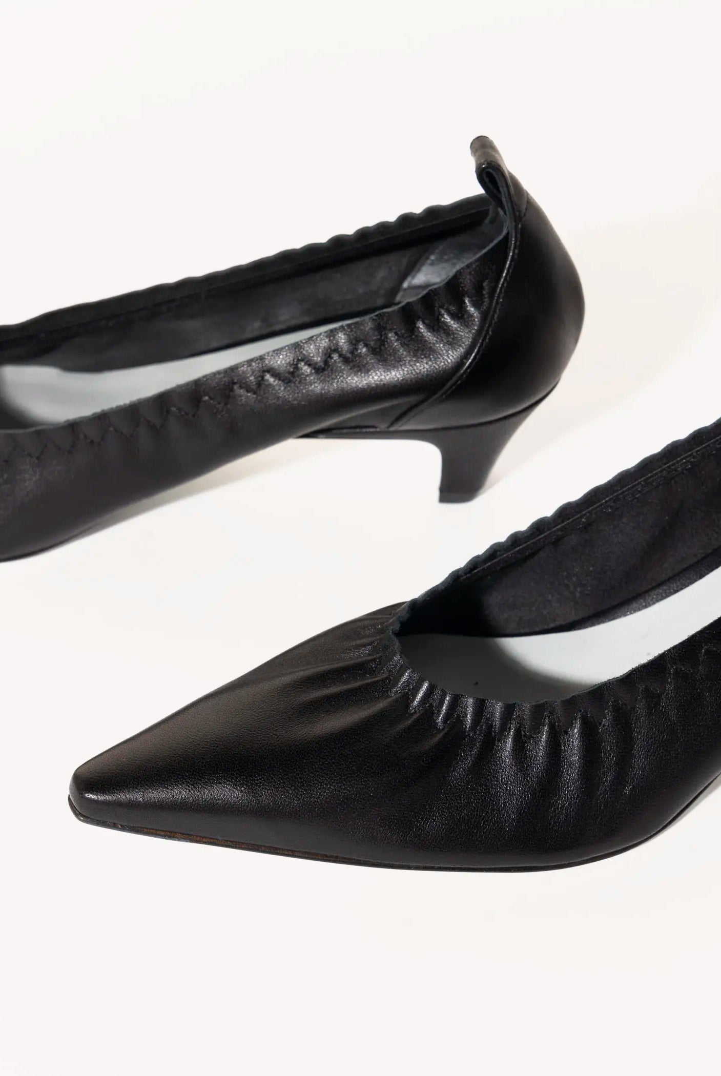 swatch_black leather iris pump heels