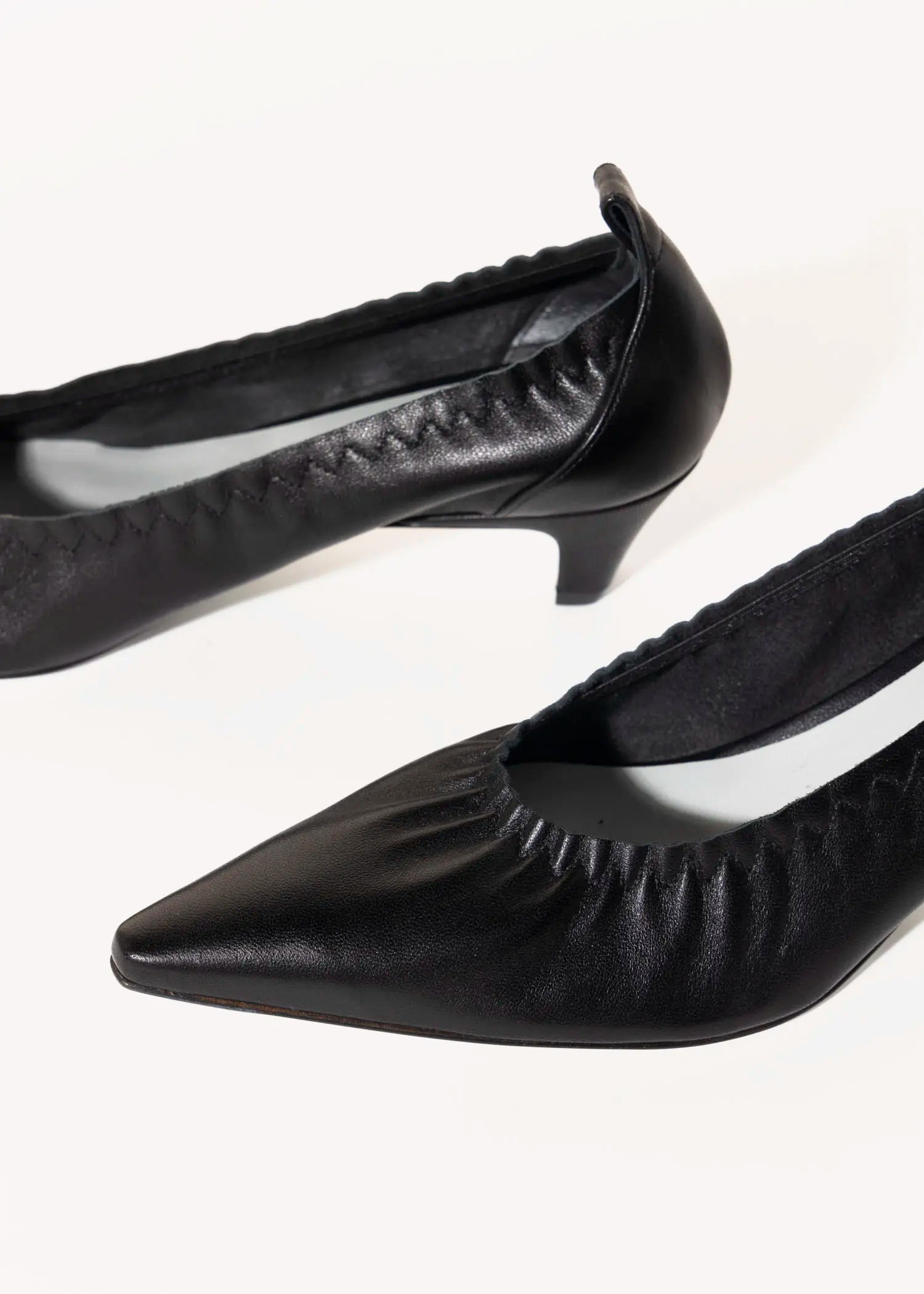 swatch_black leather iris pump heels