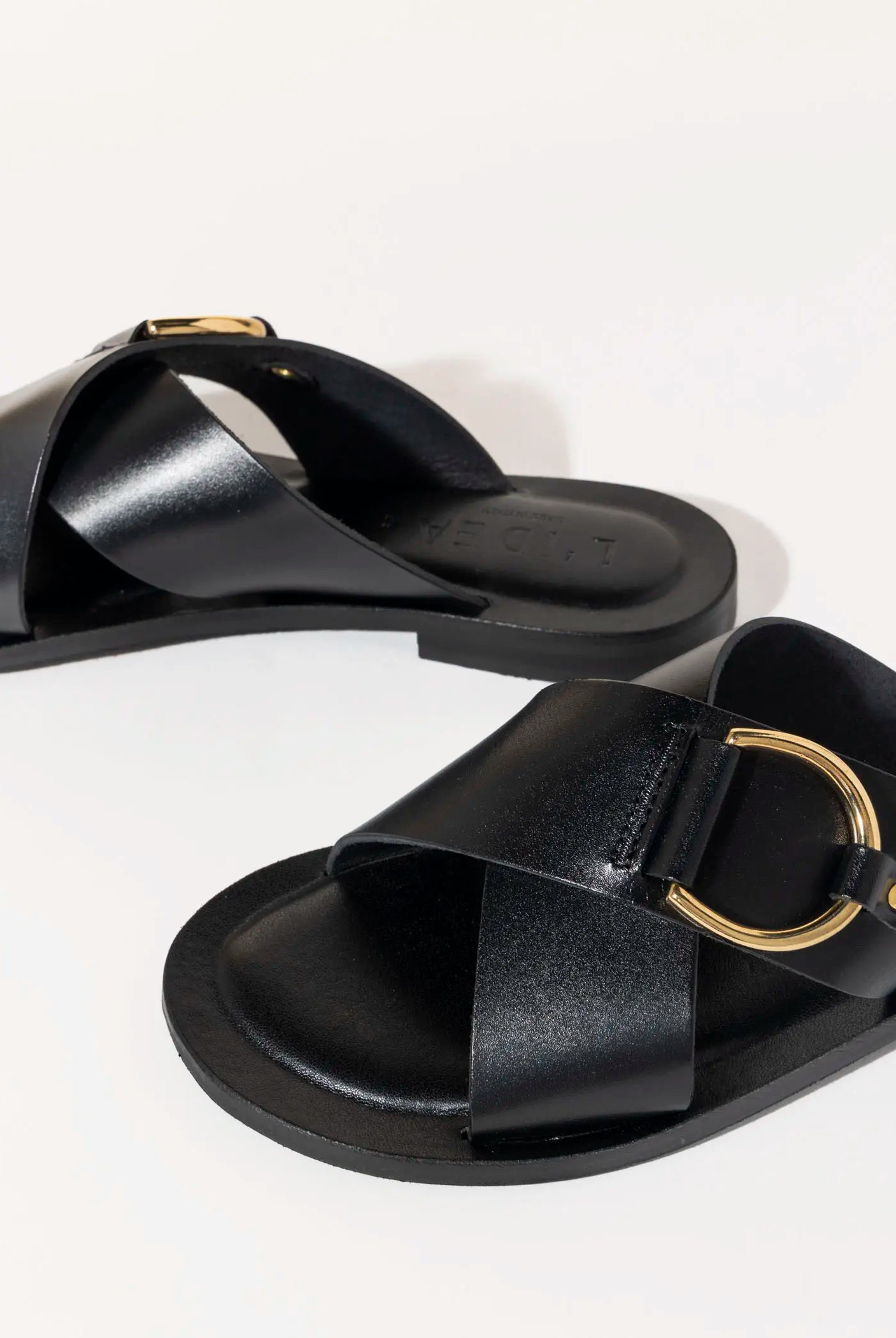 swatch_black leather crossband flat sandal flat sandals