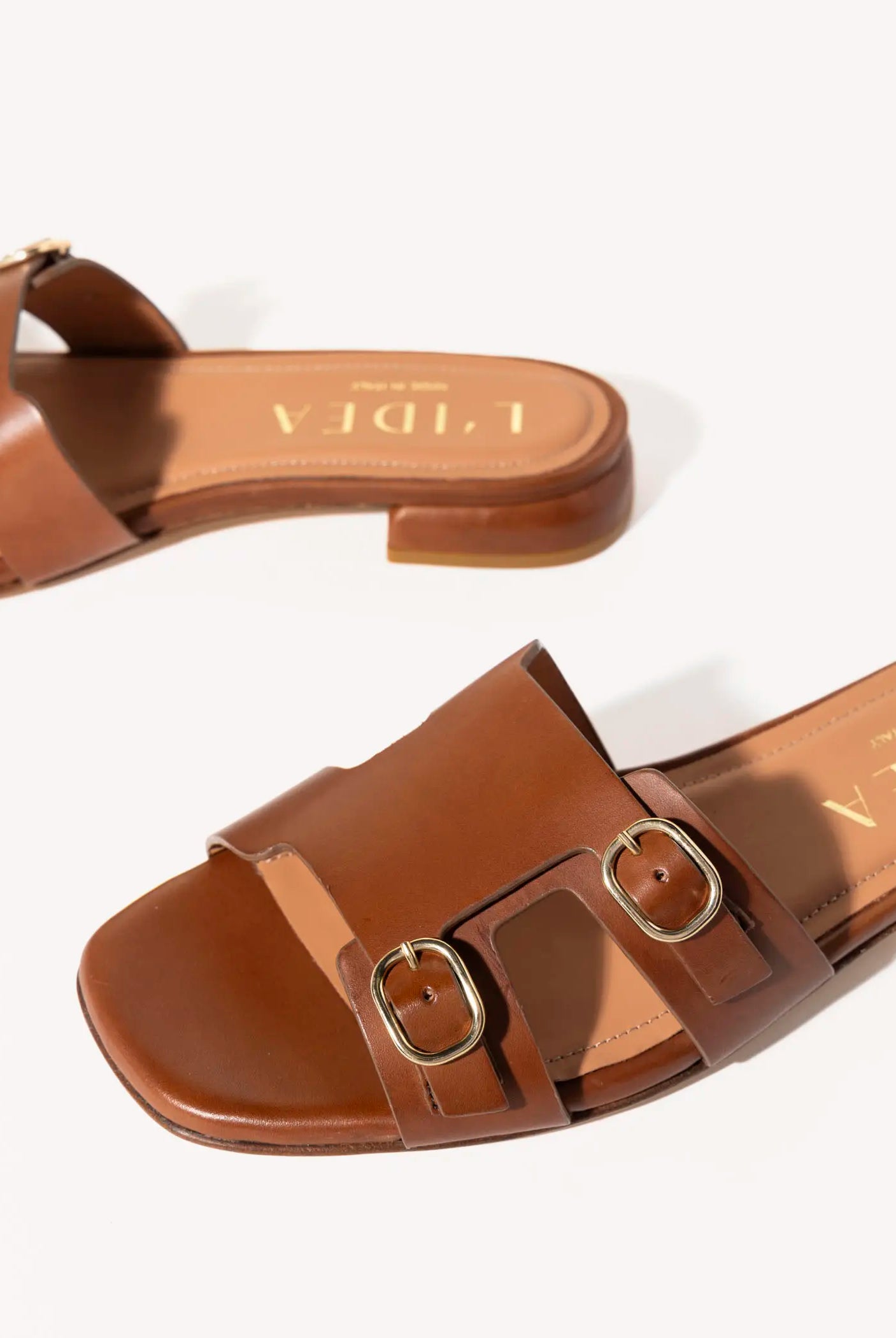 swatch_brown leather monk strap sandal flat sandals