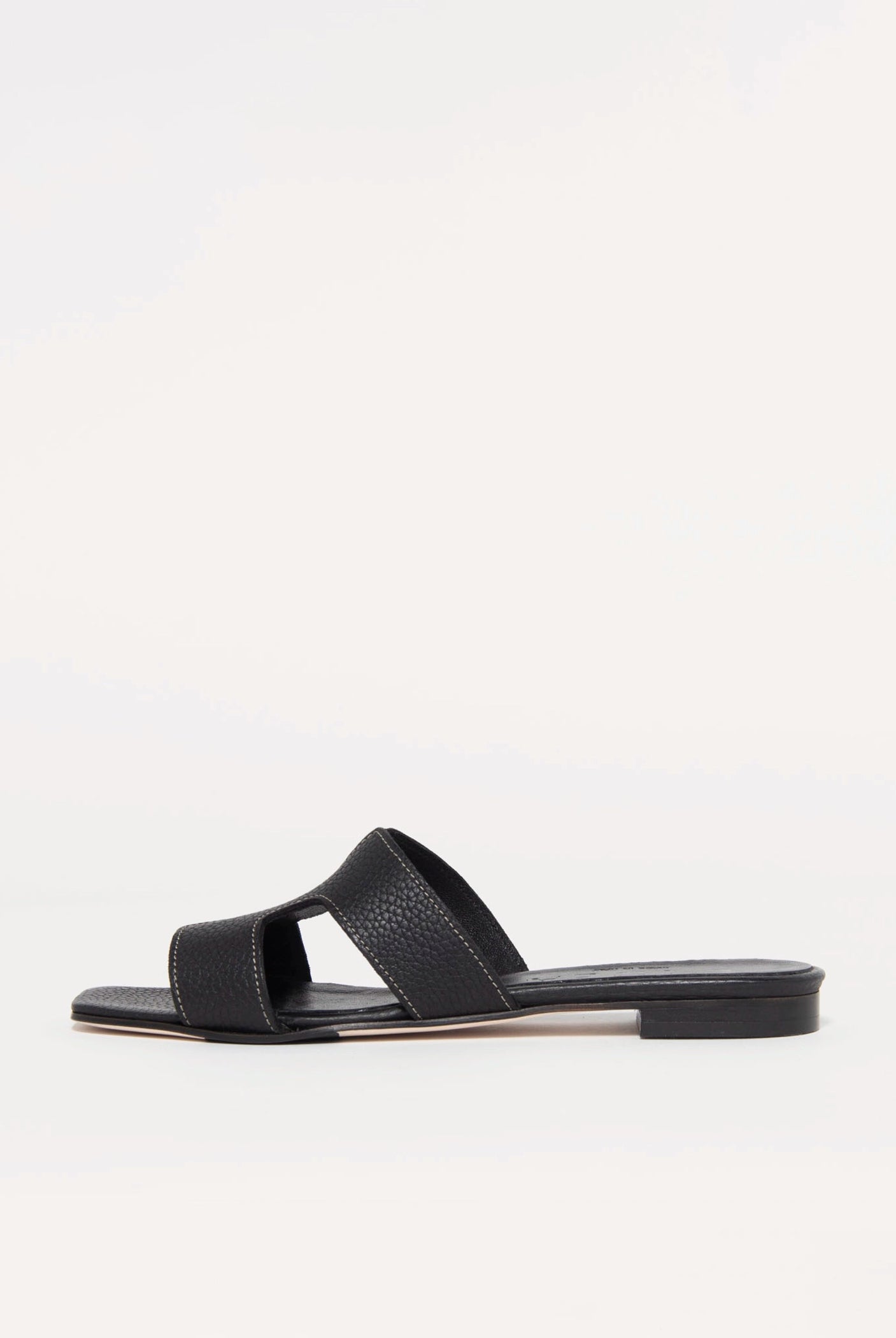 swatch_black leather leather cutout sandal flat sandals