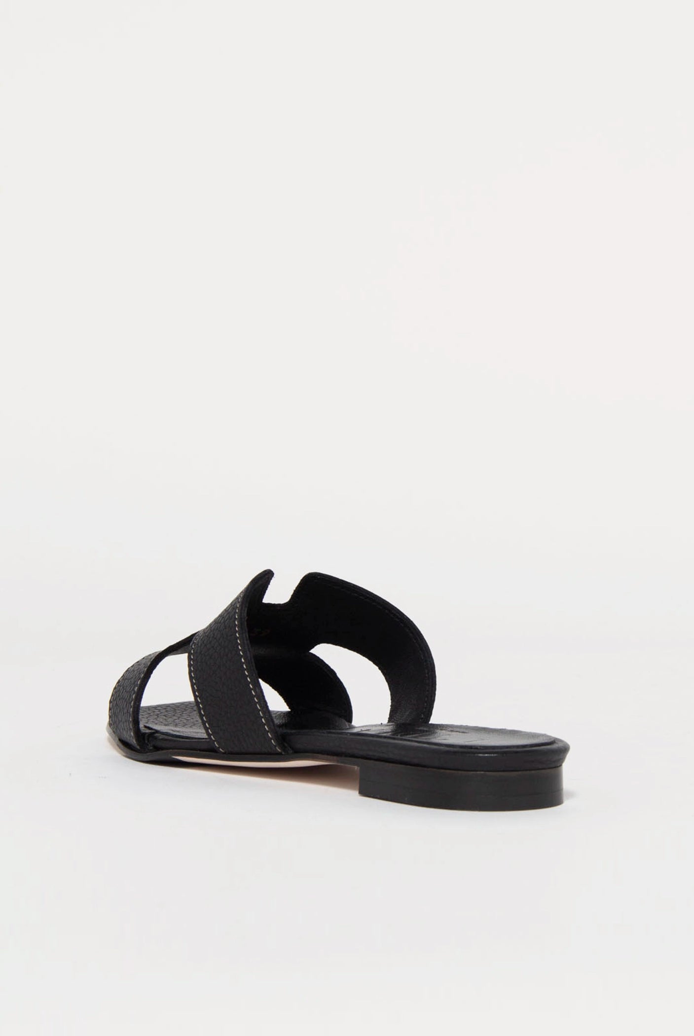 swatch_black leather leather cutout sandal flat sandals
