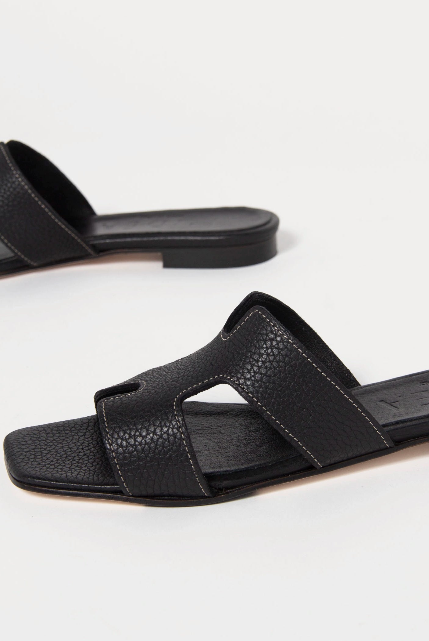 swatch_black leather leather cutout sandal flat sandals