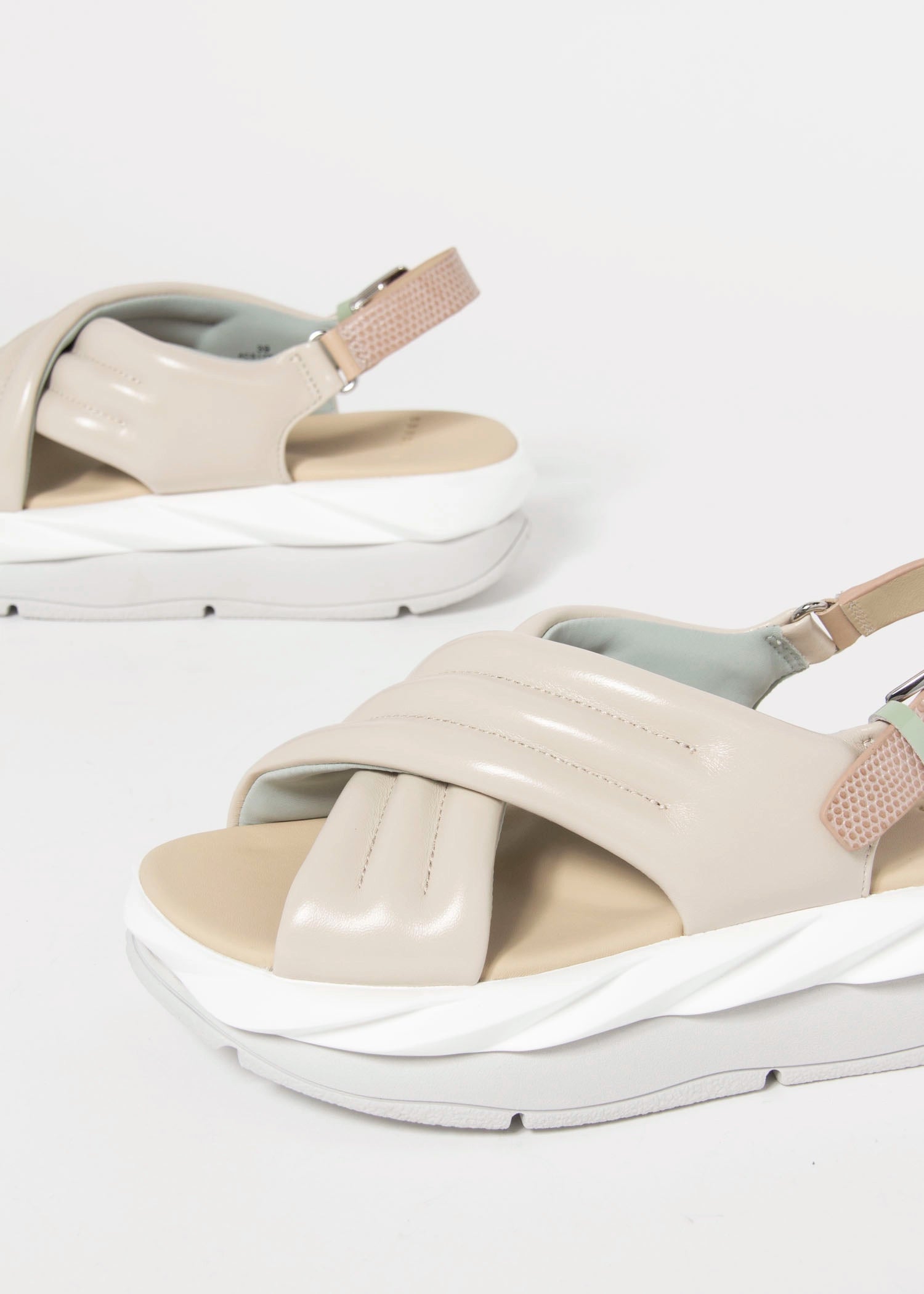 swatch_Cream Patent 4ccccees mellow mana platform sandal