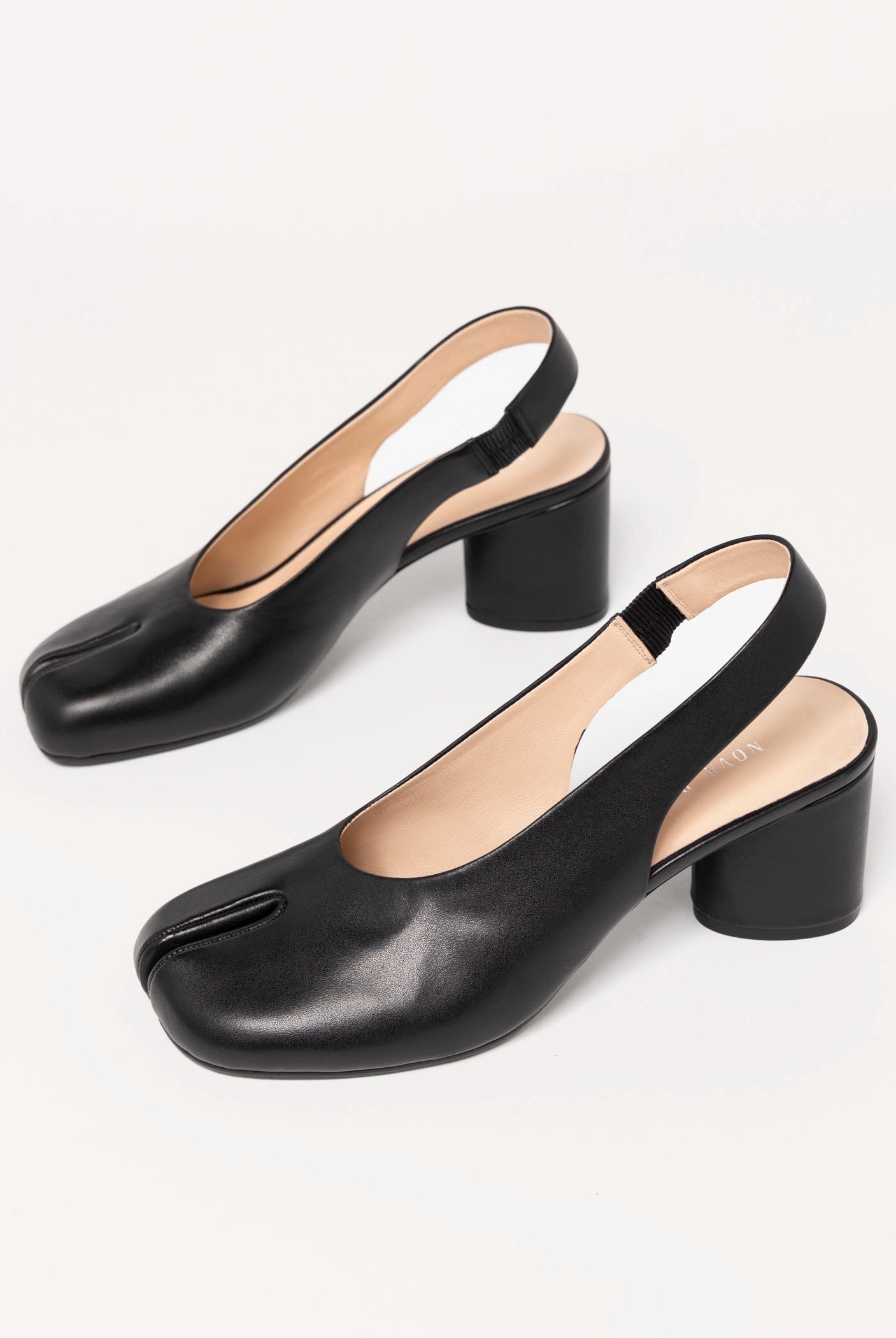 swatch_Black Leather tabi slingback pump
