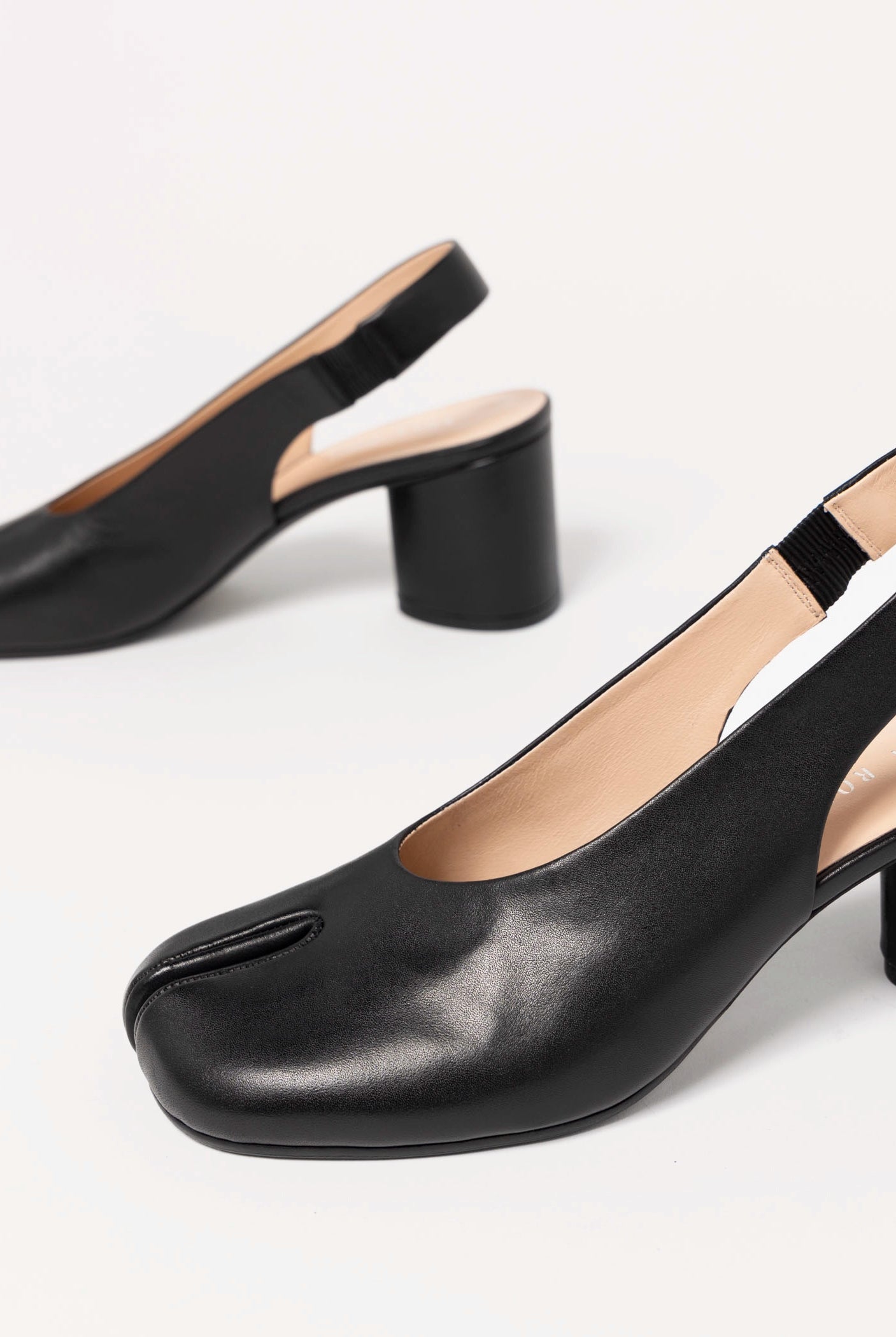 swatch_Black Leather tabi slingback pump