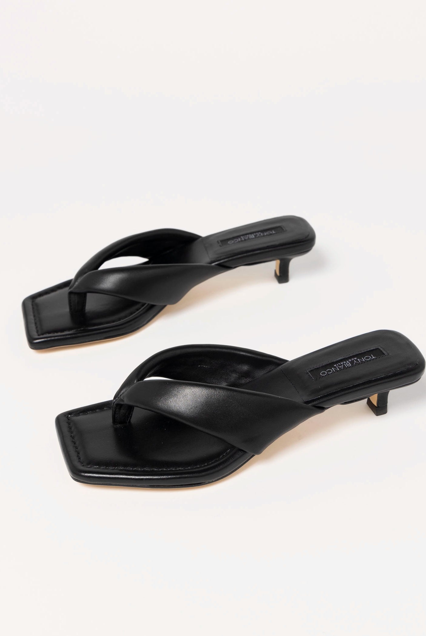 swatch_Black Leather Tony Bianco tropic heeled thong