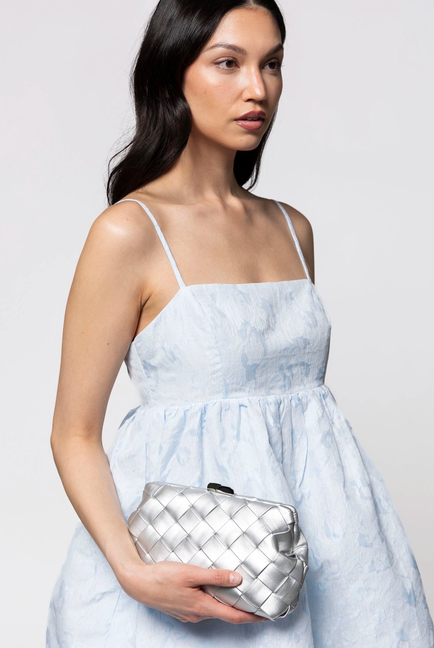 swatch_Silver olga berg quinn woven leather clutch