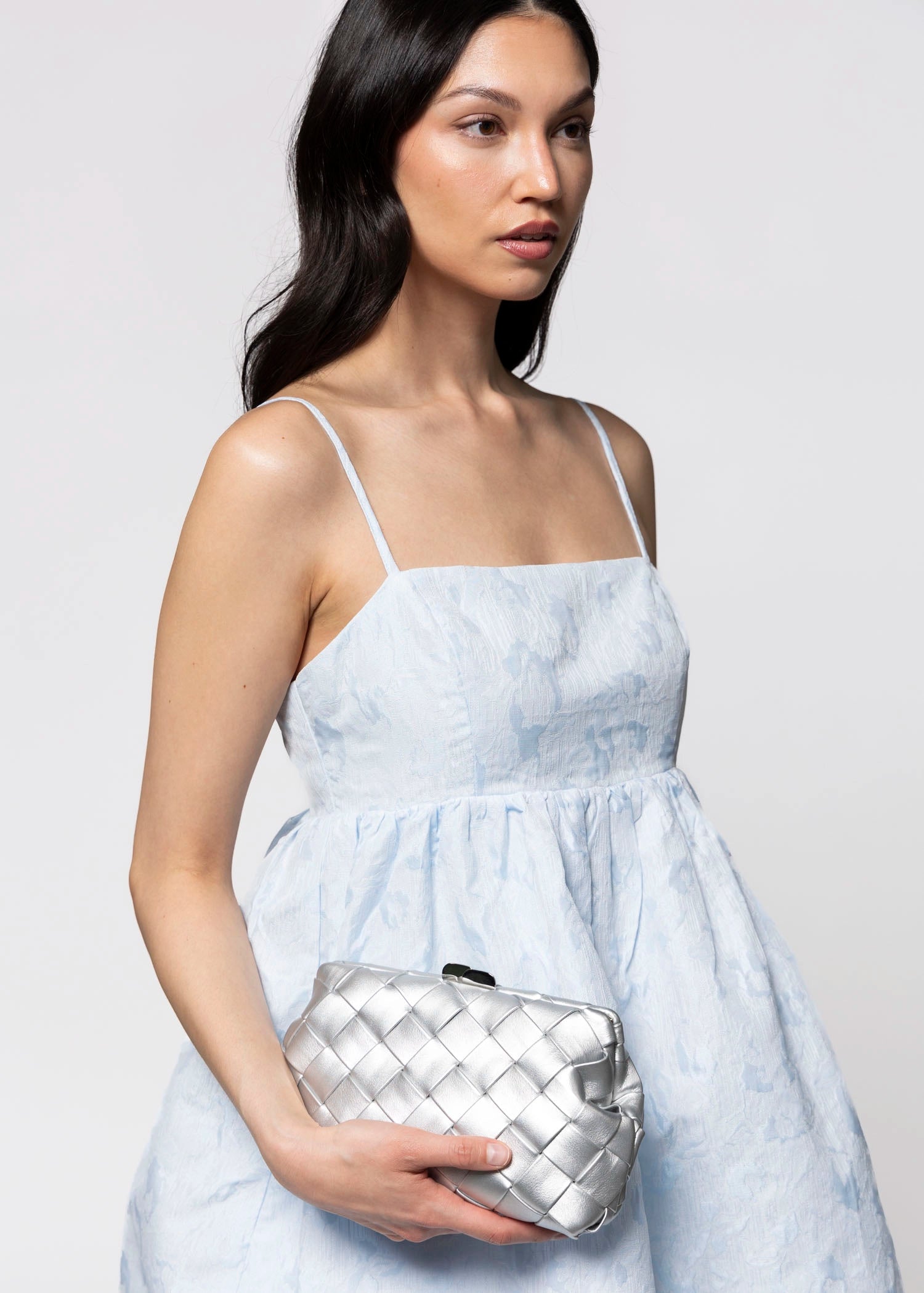 swatch_Silver olga berg quinn woven leather clutch