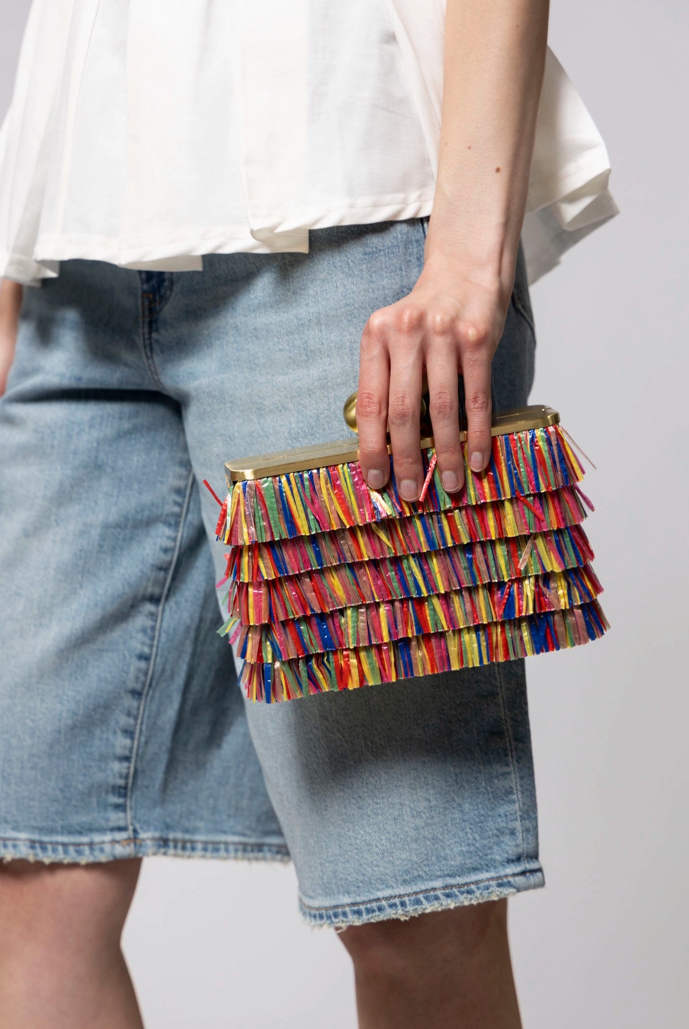 swatch_Multi olga berg carlita carnivale fringe clutch