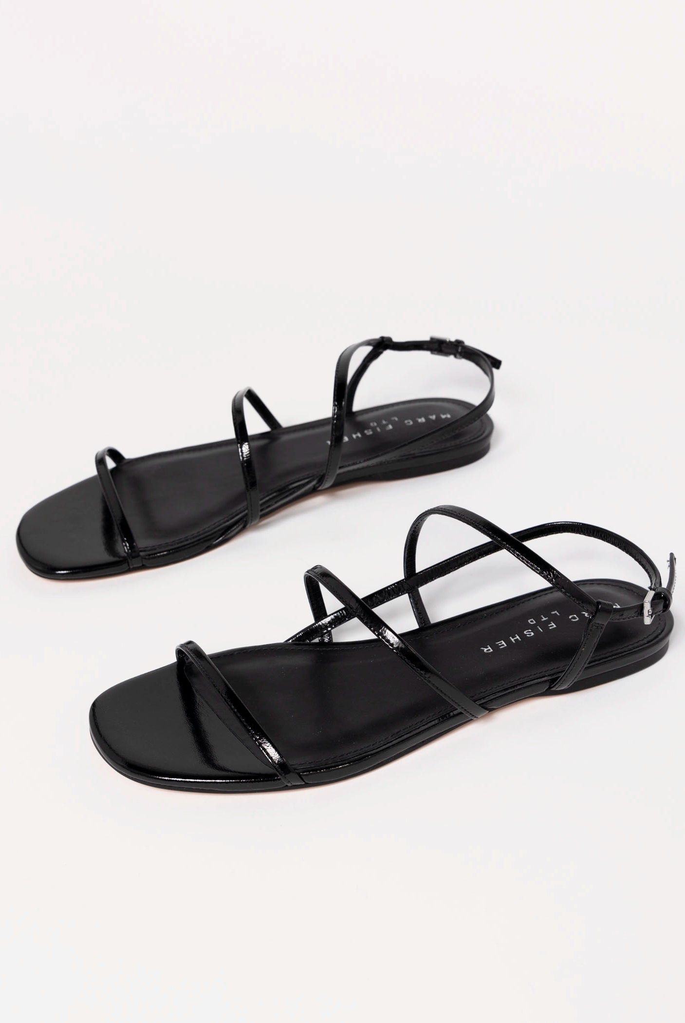 swatch_Black Leather marc fisher elysha flat sandal
