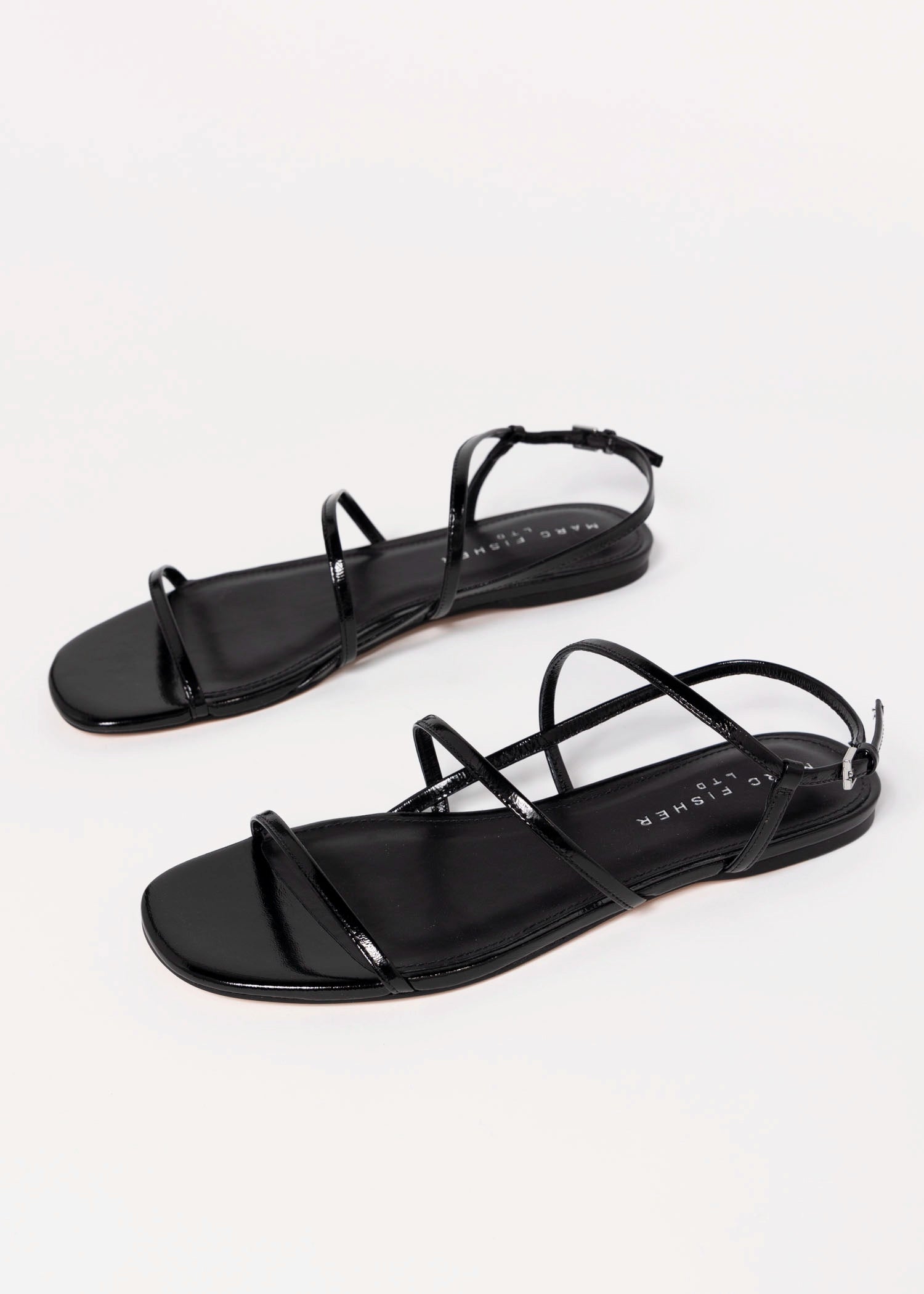 swatch_Black Leather marc fisher elysha flat sandal