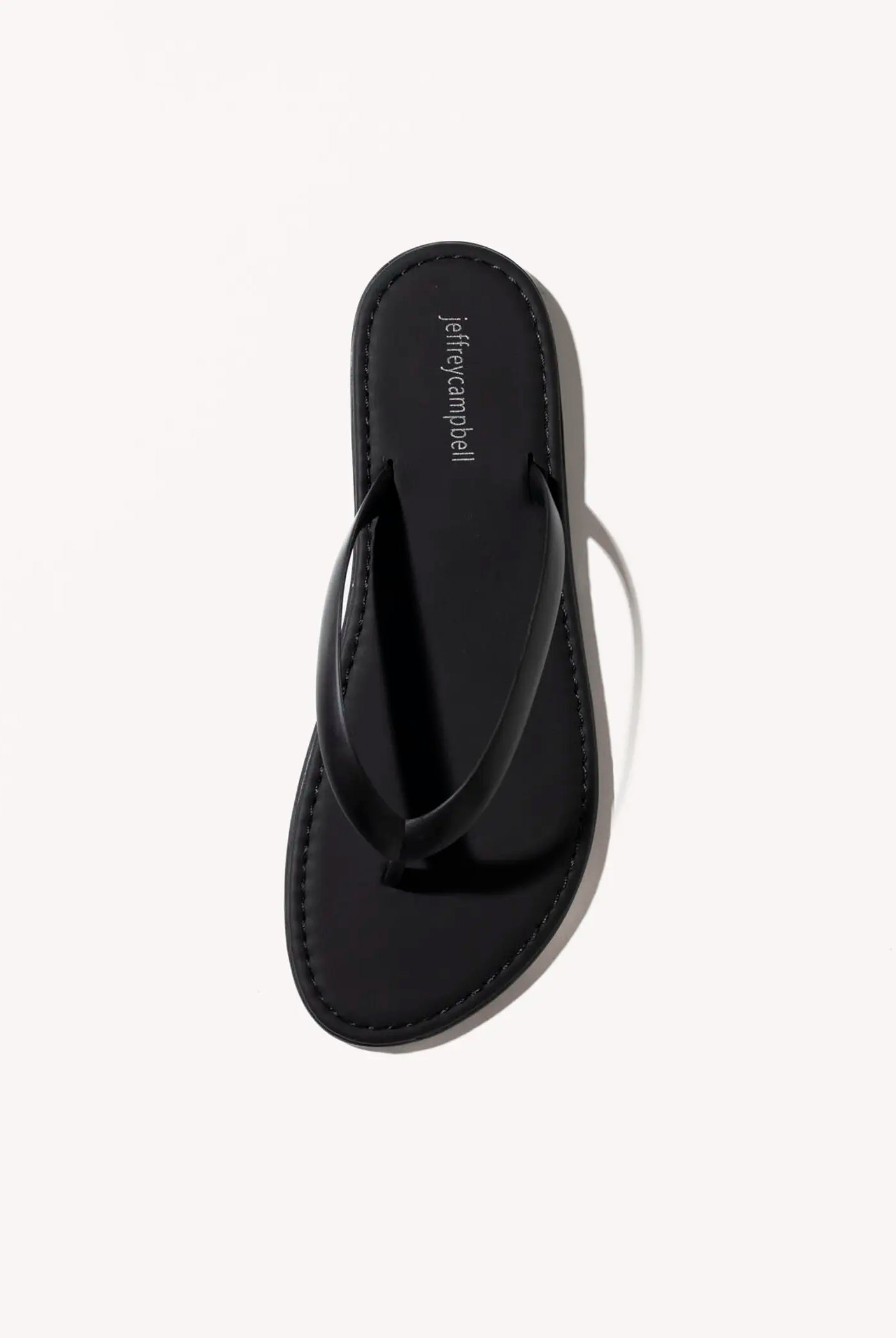 swatch_black beached jelly thong sandal flat sandals