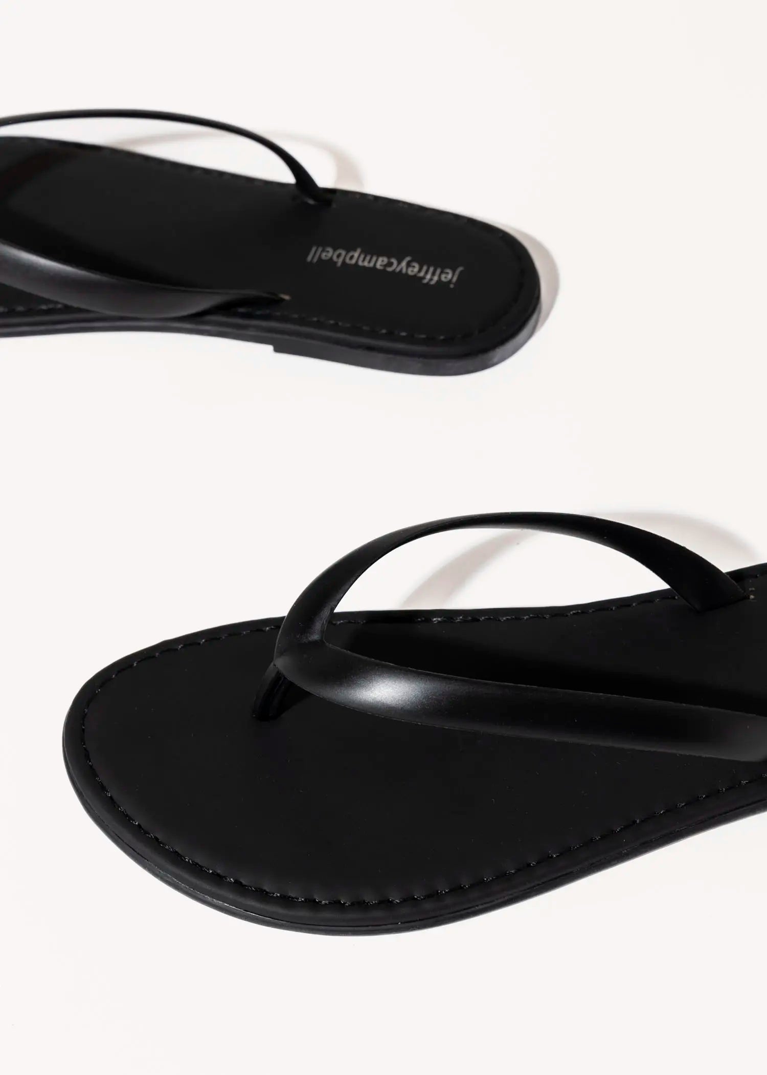 swatch_black beached jelly thong sandal flat sandals