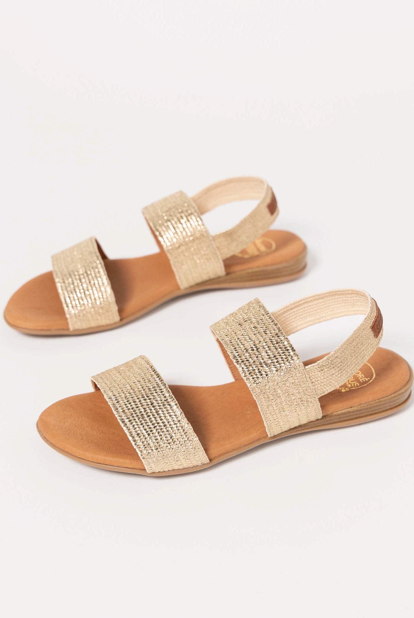 swatch_Platino andre assous nigella woven sandal