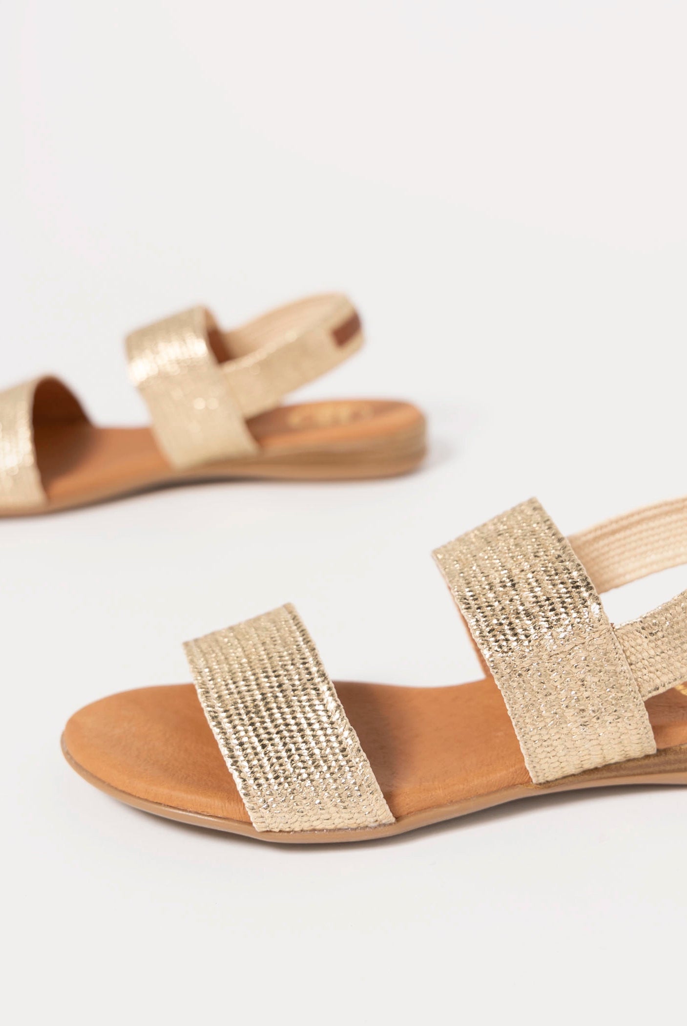 swatch_Platino andre assous nigella woven sandal