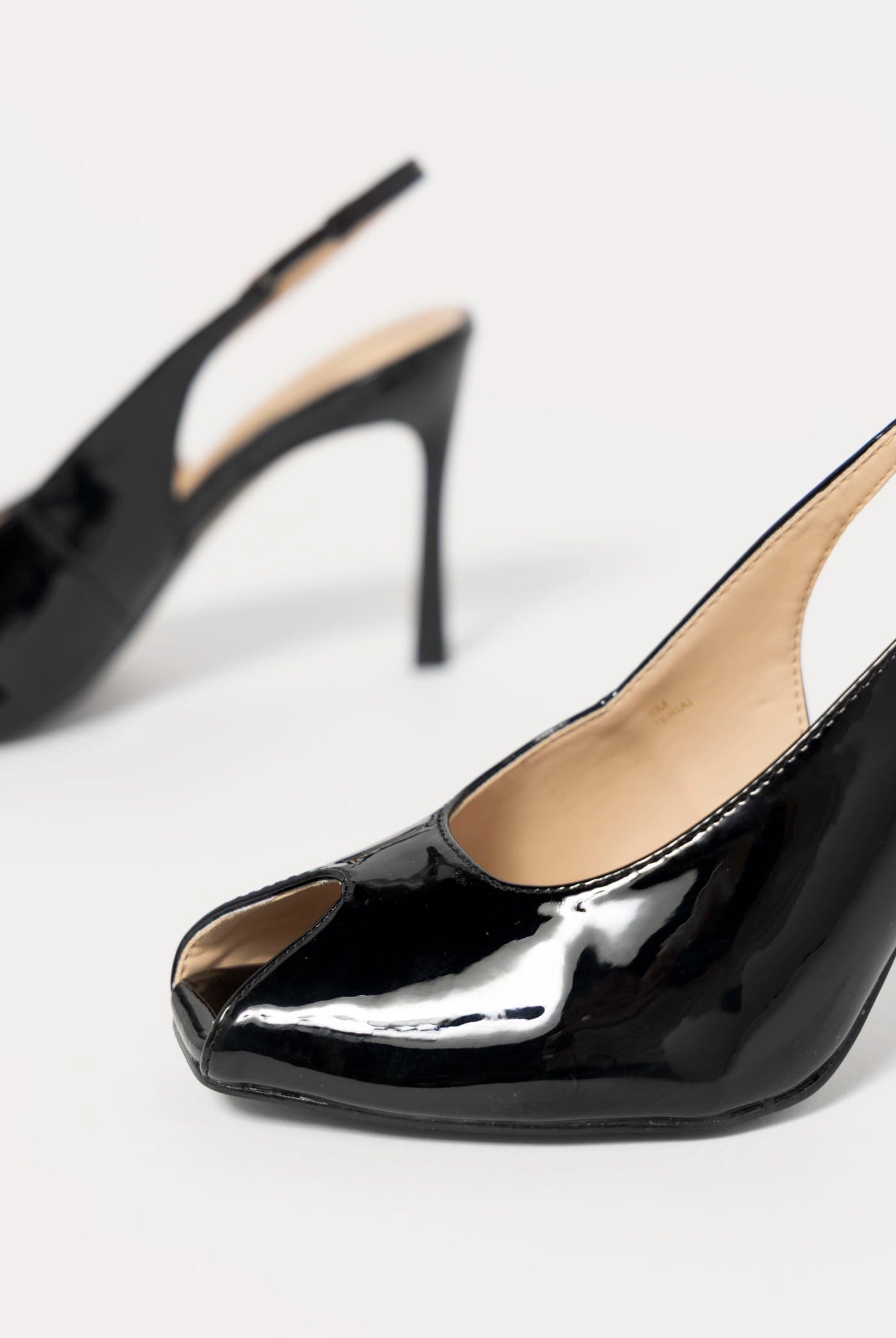 swatch_Black Patent clear cut peep toe slingback