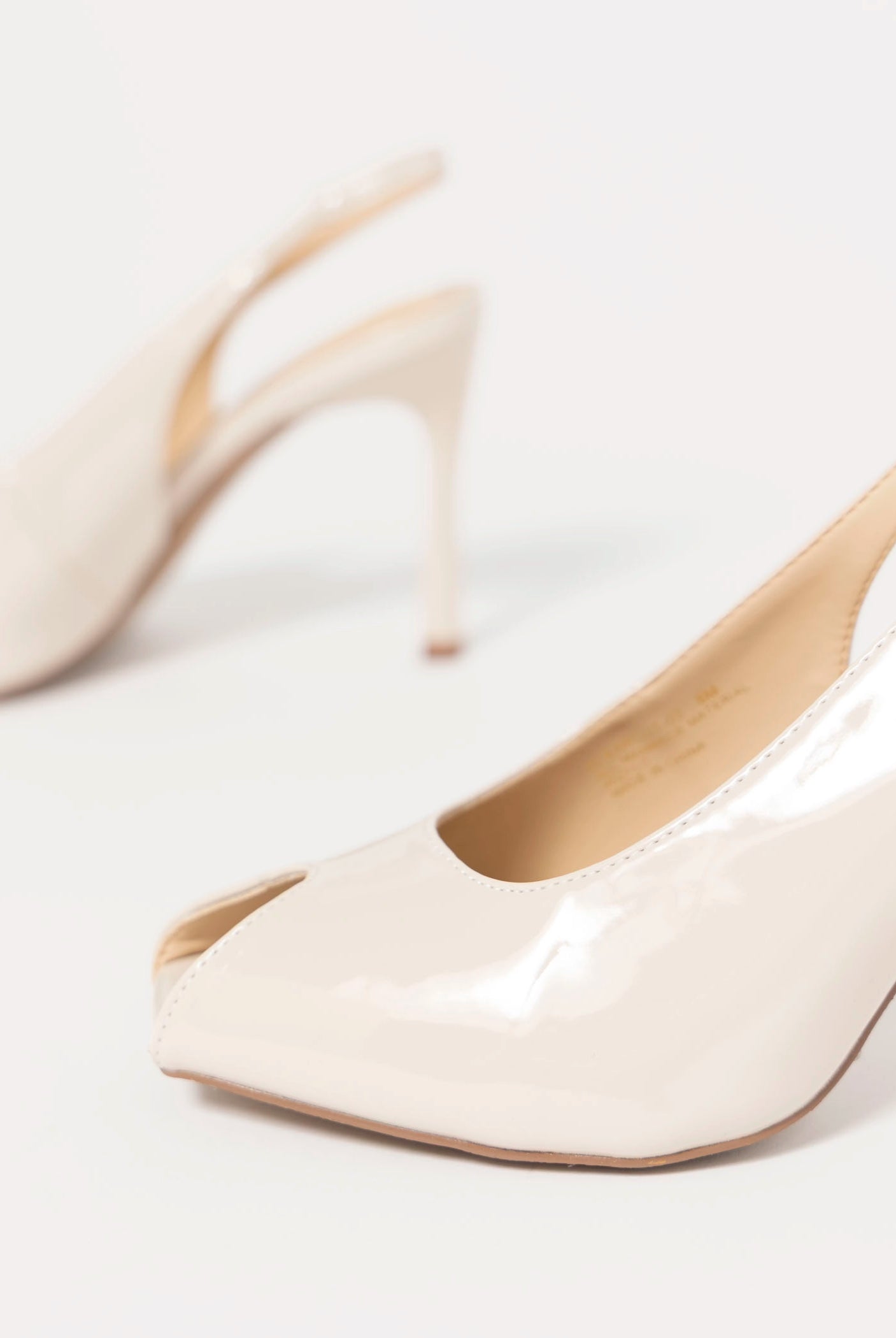 swatch_Ivory Patent clear cut peep toe slingback