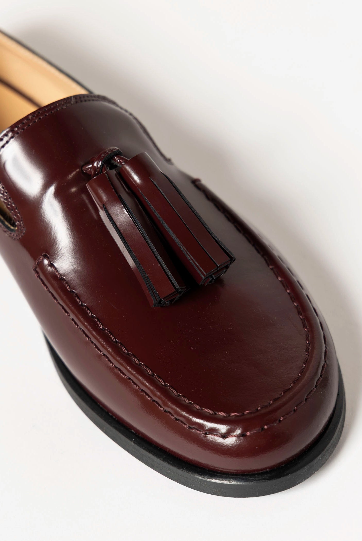 swatch_prune leather tassel loafer