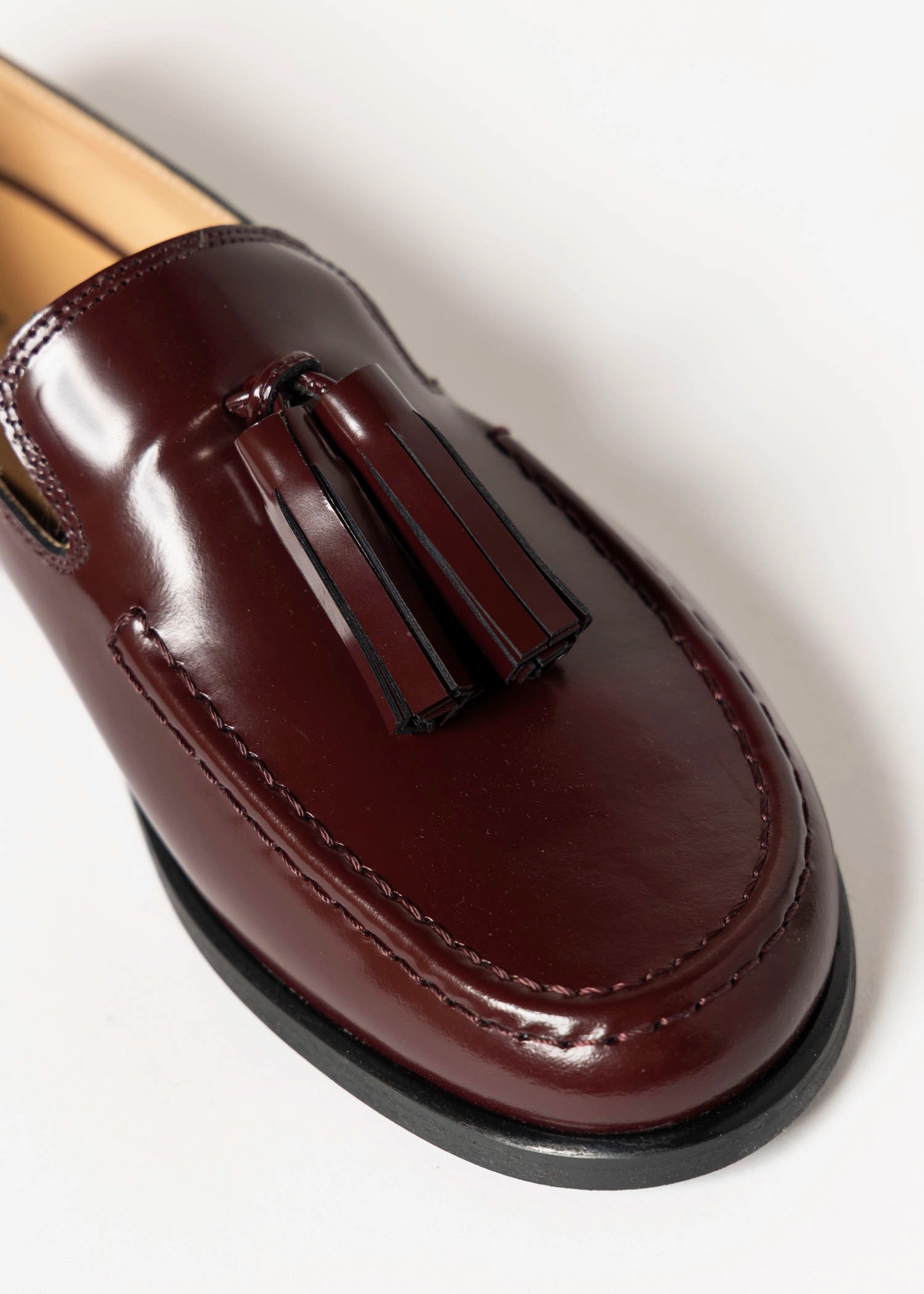 swatch_prune leather tassel loafer