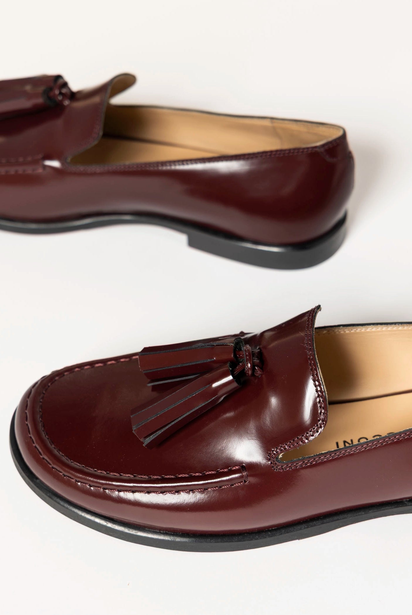 swatch_prune leather tassel loafer