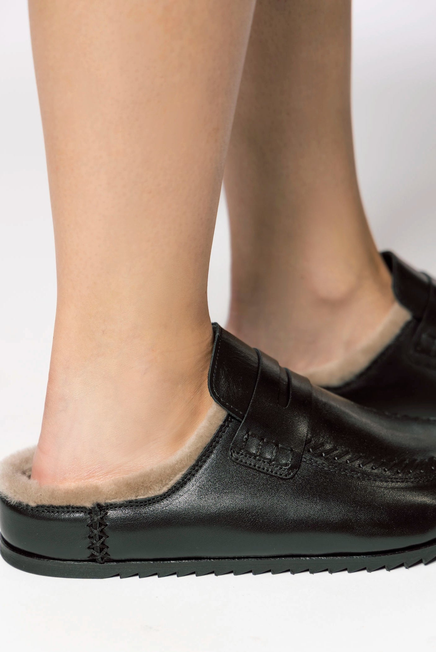 swatch_Black Leather shearling lined clog shoes