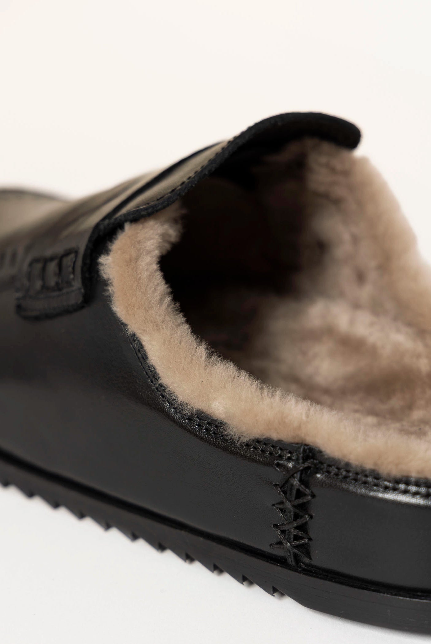 swatch_Black Leather shearling lined clog shoes