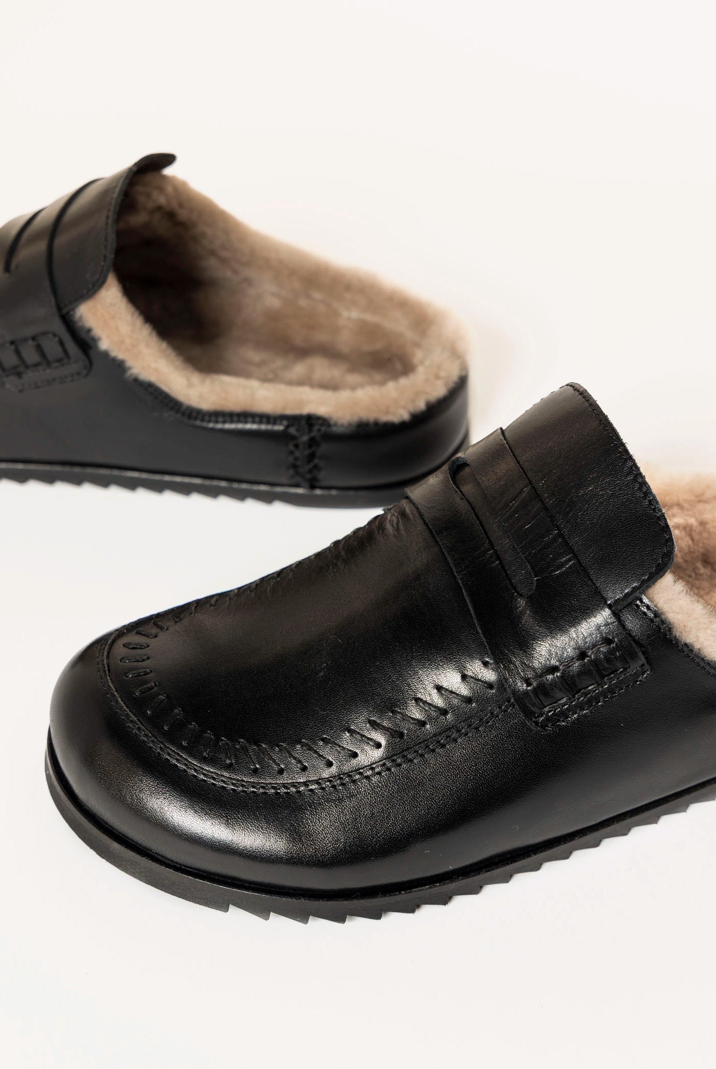 swatch_Black Leather shearling lined clog shoes