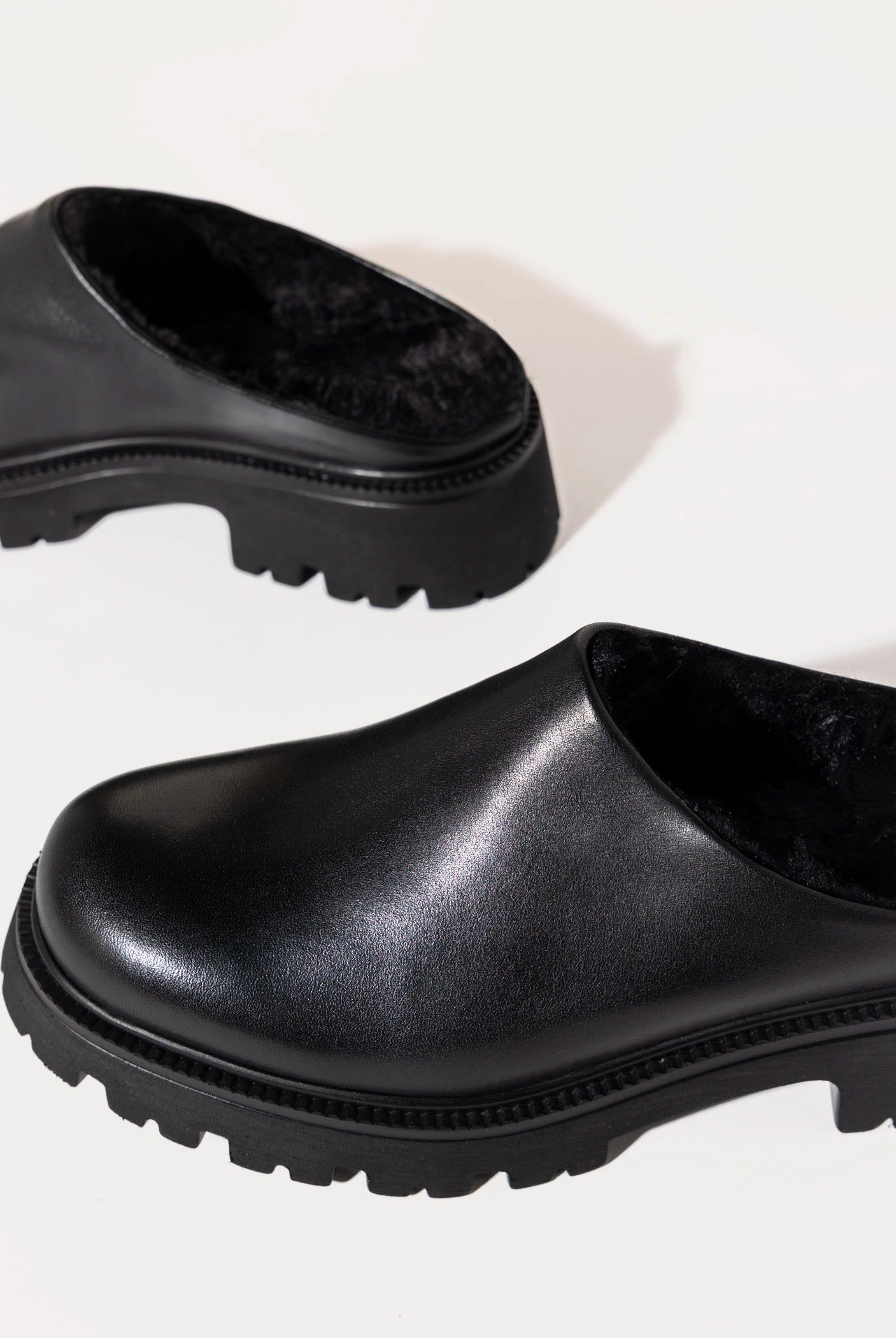 swatch_Black Leather fur lined clog shoes