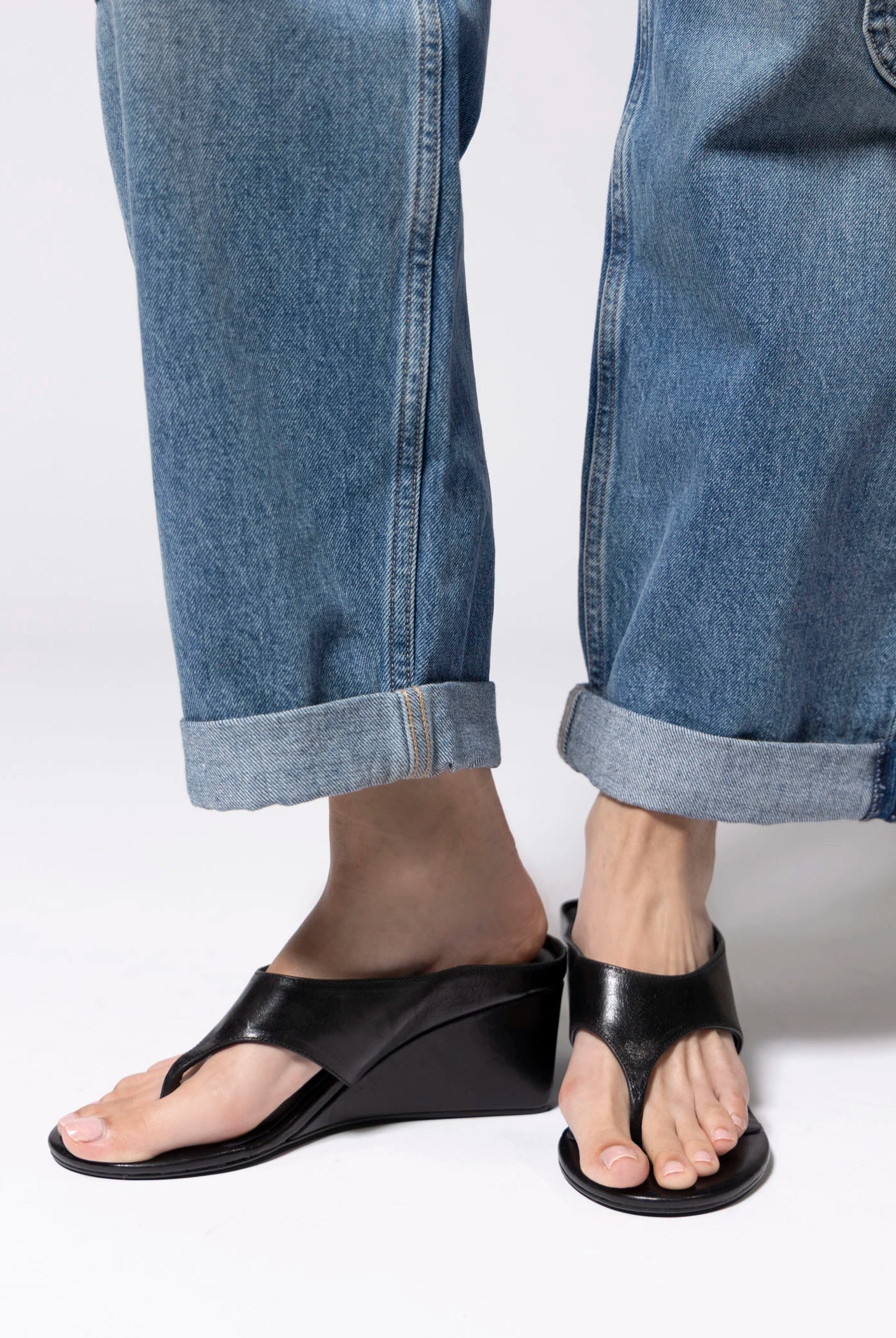 swatch_Black Leather tony bianco swift thong wedge sandal