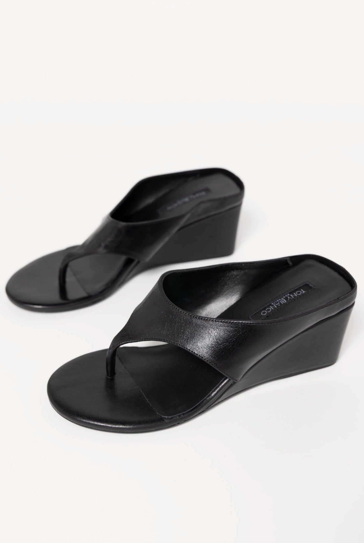 swatch_Black Leather tony bianco swift thong wedge sandal