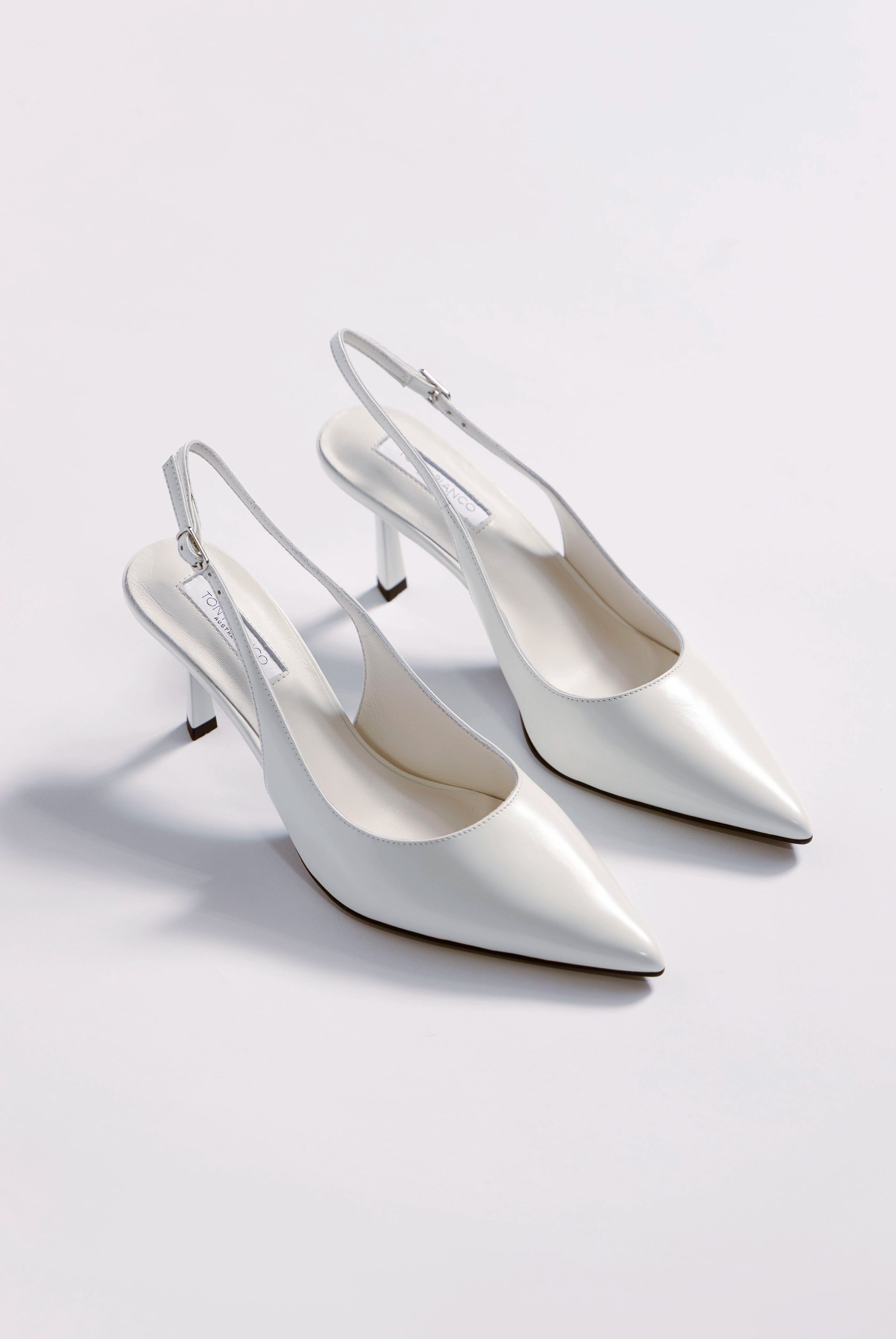 swatch_White Leather tony bianco baz slingback heel