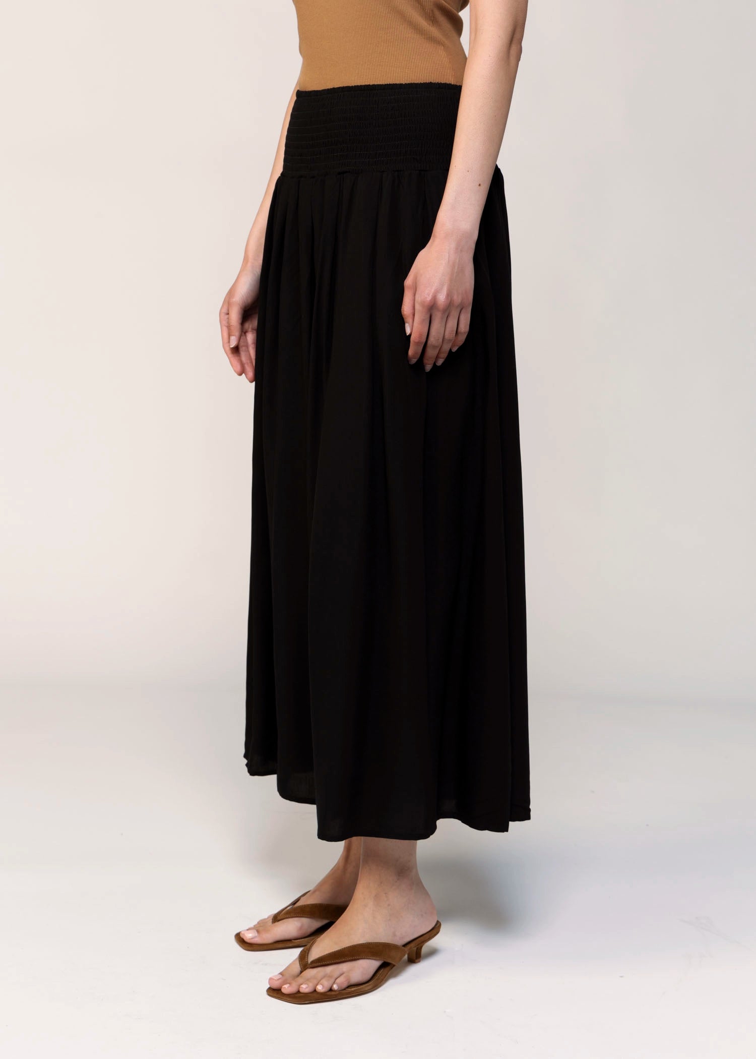 swatch_Black smocked waist midi skirt