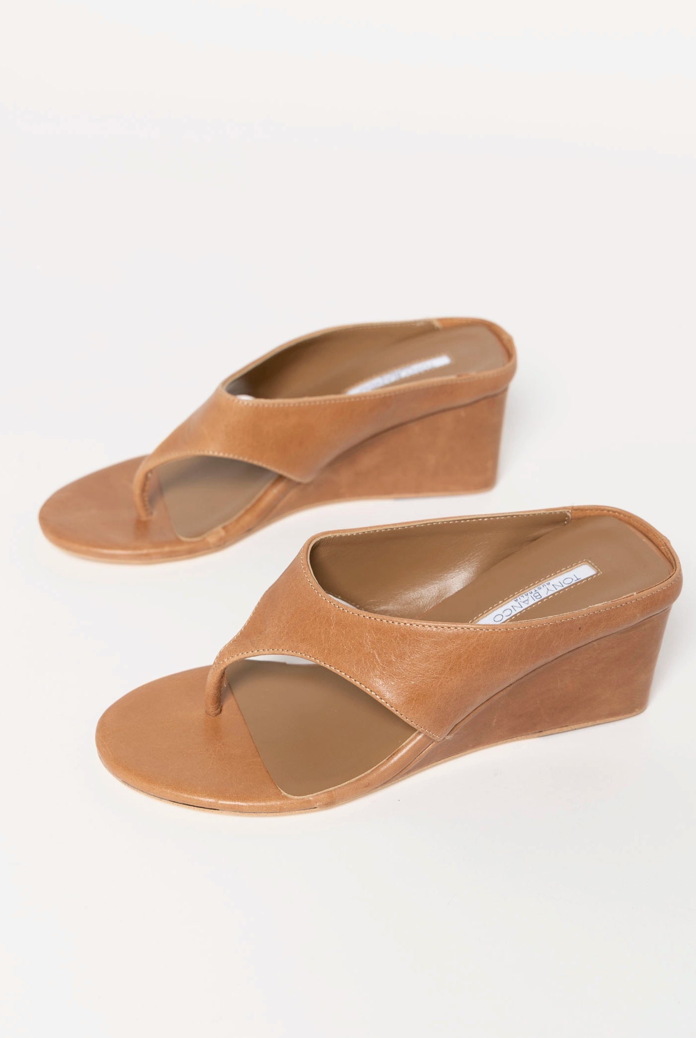 swatch_Tan Leather tony bianco swift thong wedge sandal
