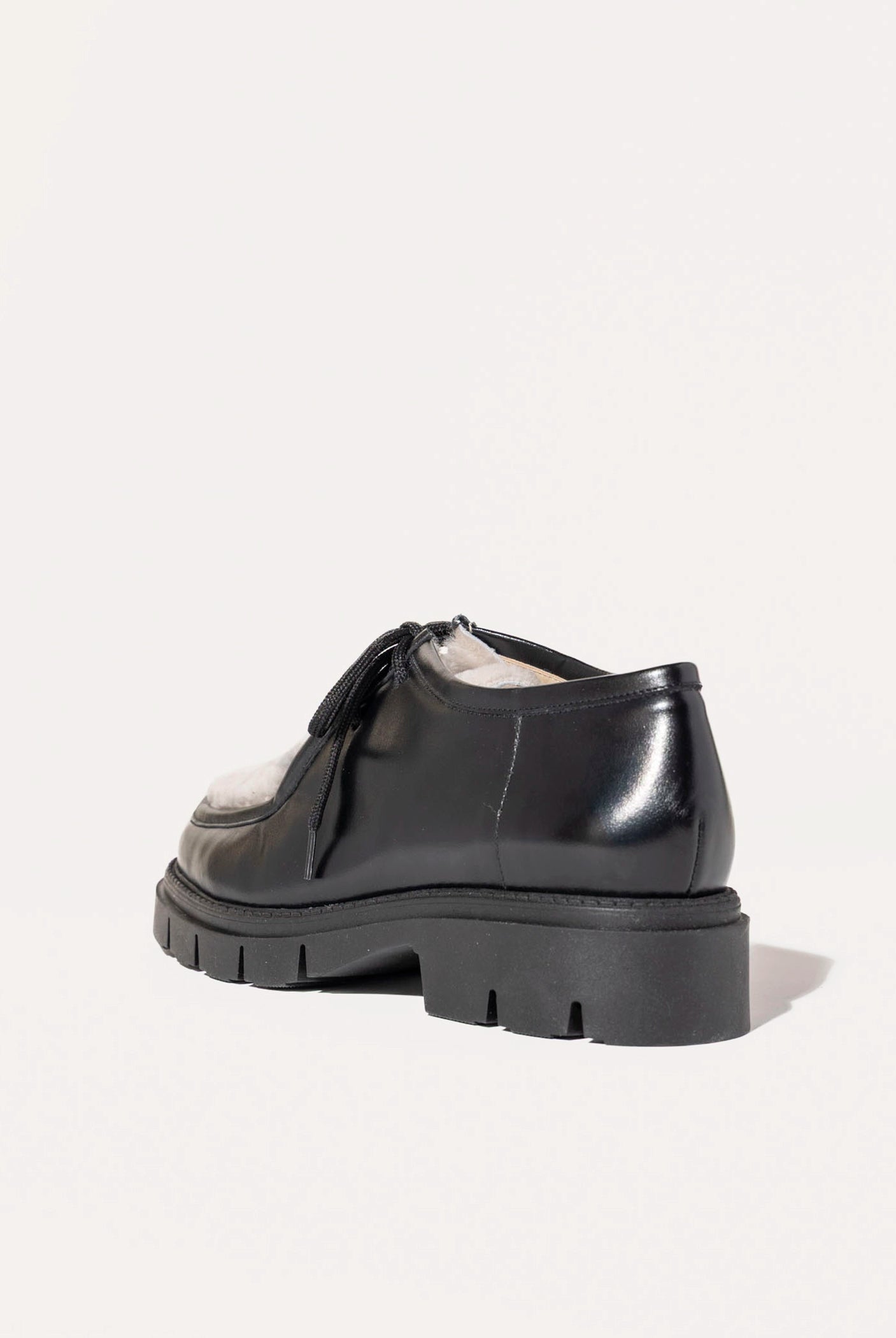 swatch_Black Leather shearling wallabe