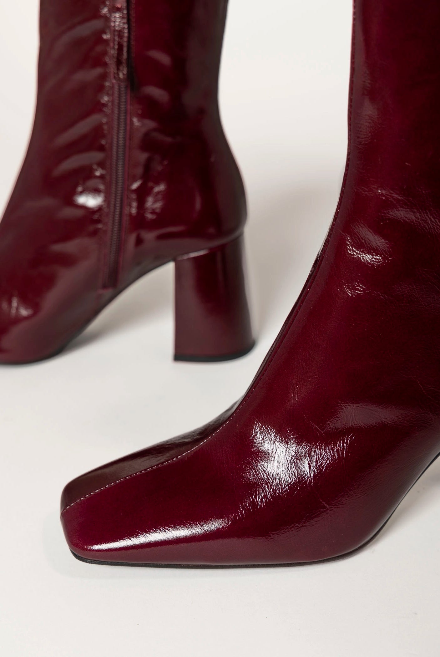 swatch_eggplant patent drimia heeled boot ankle boots