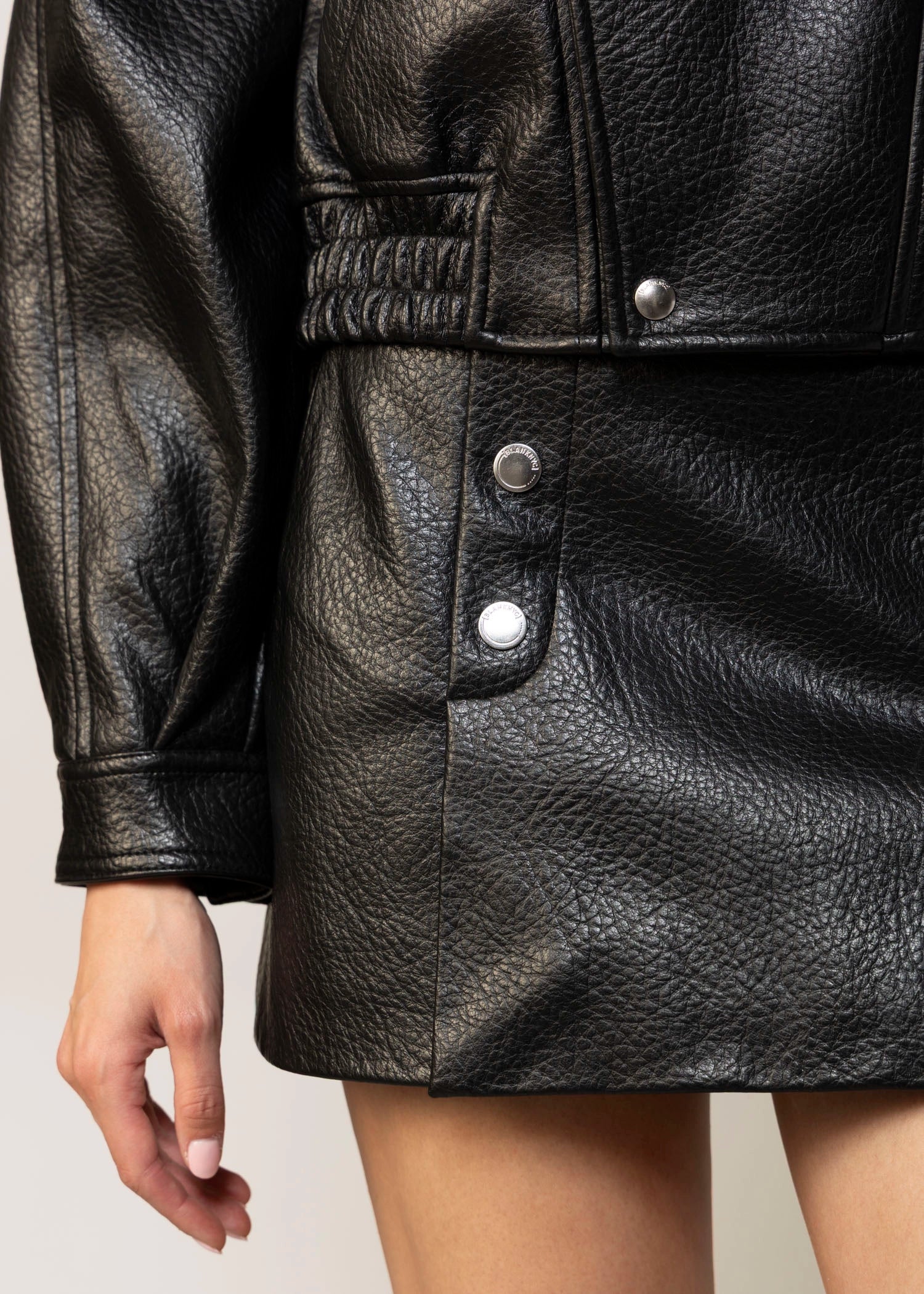 swatch_Black blank nyc night moves vegan leather skirt