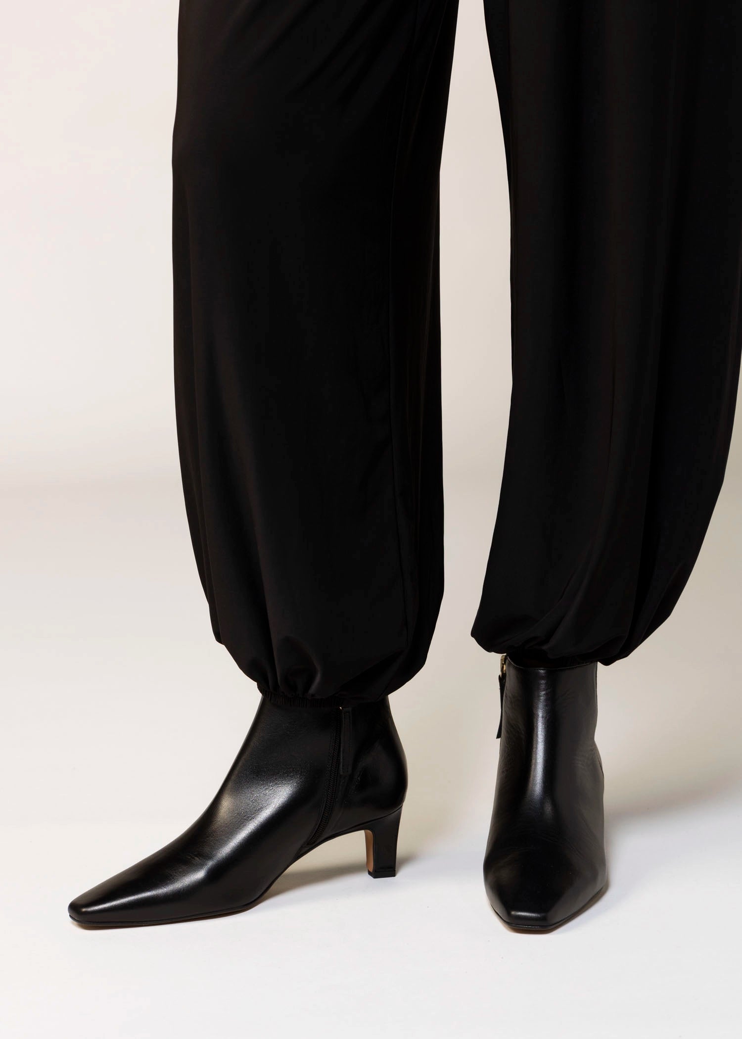 swatch_Black Leather angel alarcon heeled ankle boot