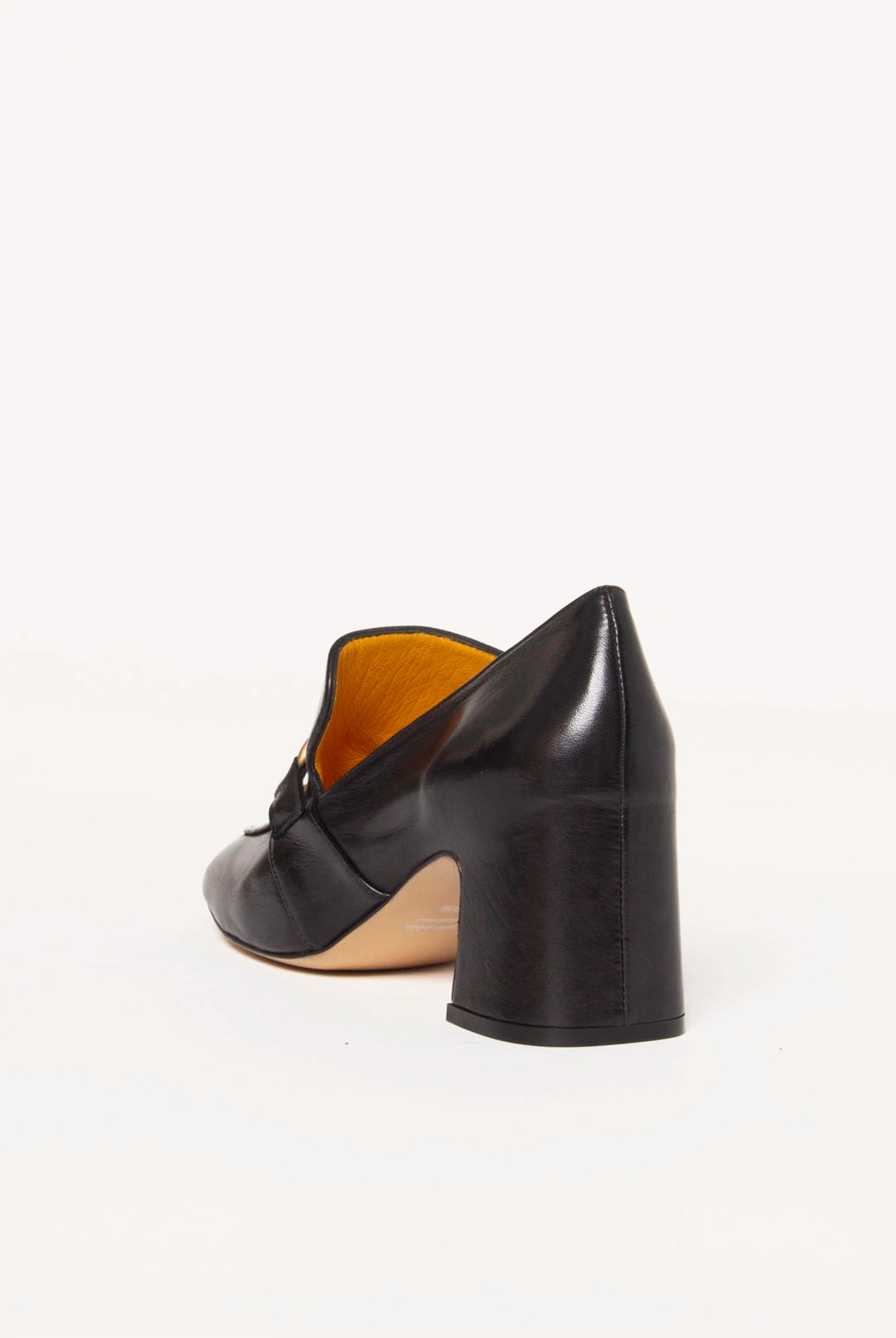 swatch_black leather heeled loafer