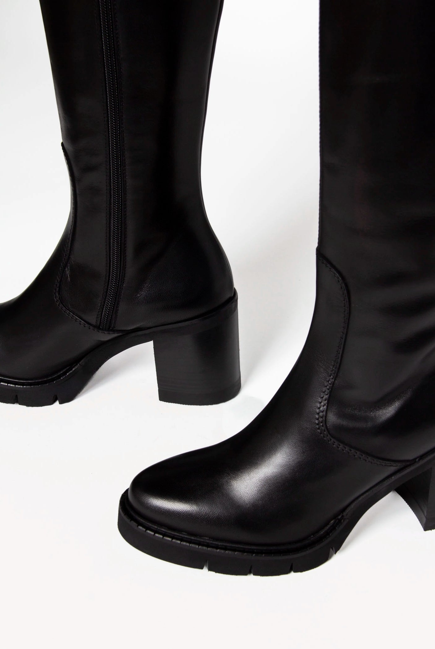swatch_Black Leather knee high heeled boot boots