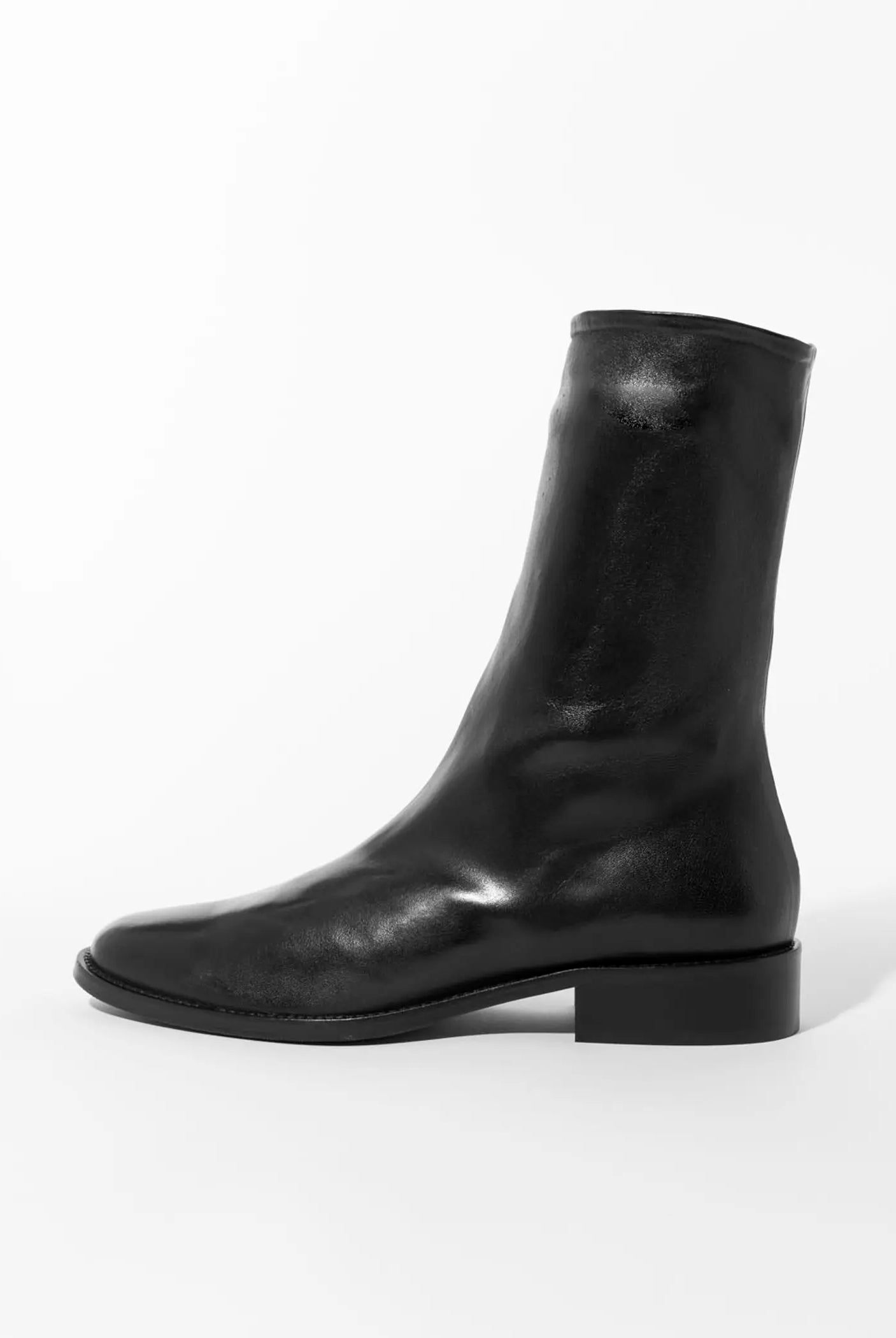 swatch_Black Leather pull on leather bootie shoes