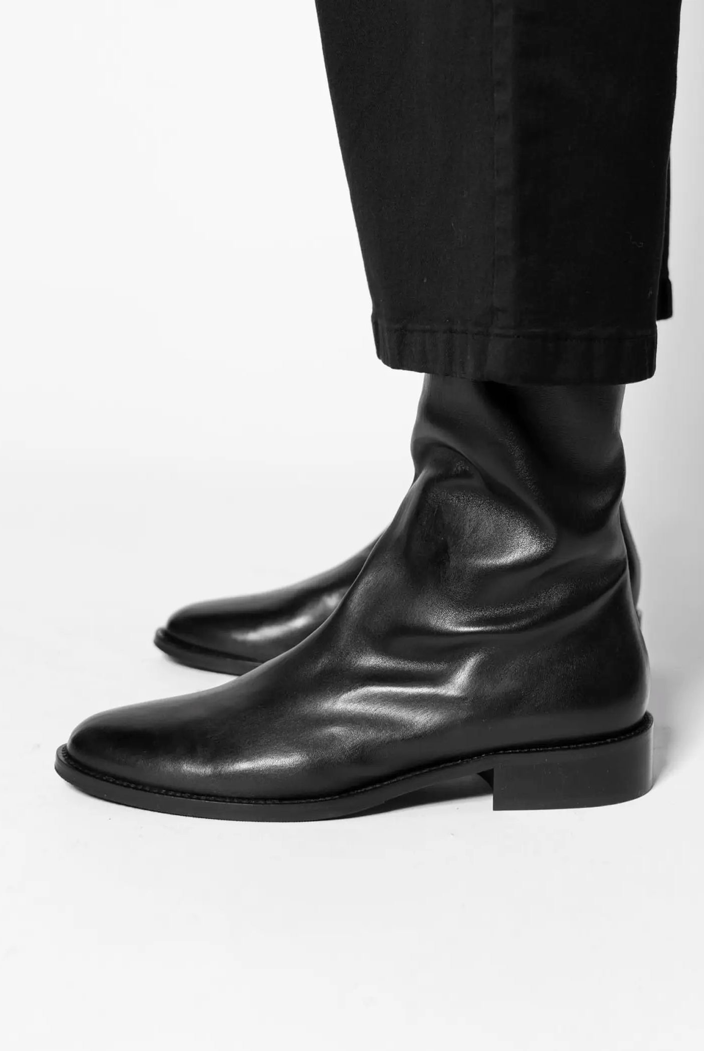 swatch_Black Leather pull on leather bootie shoes