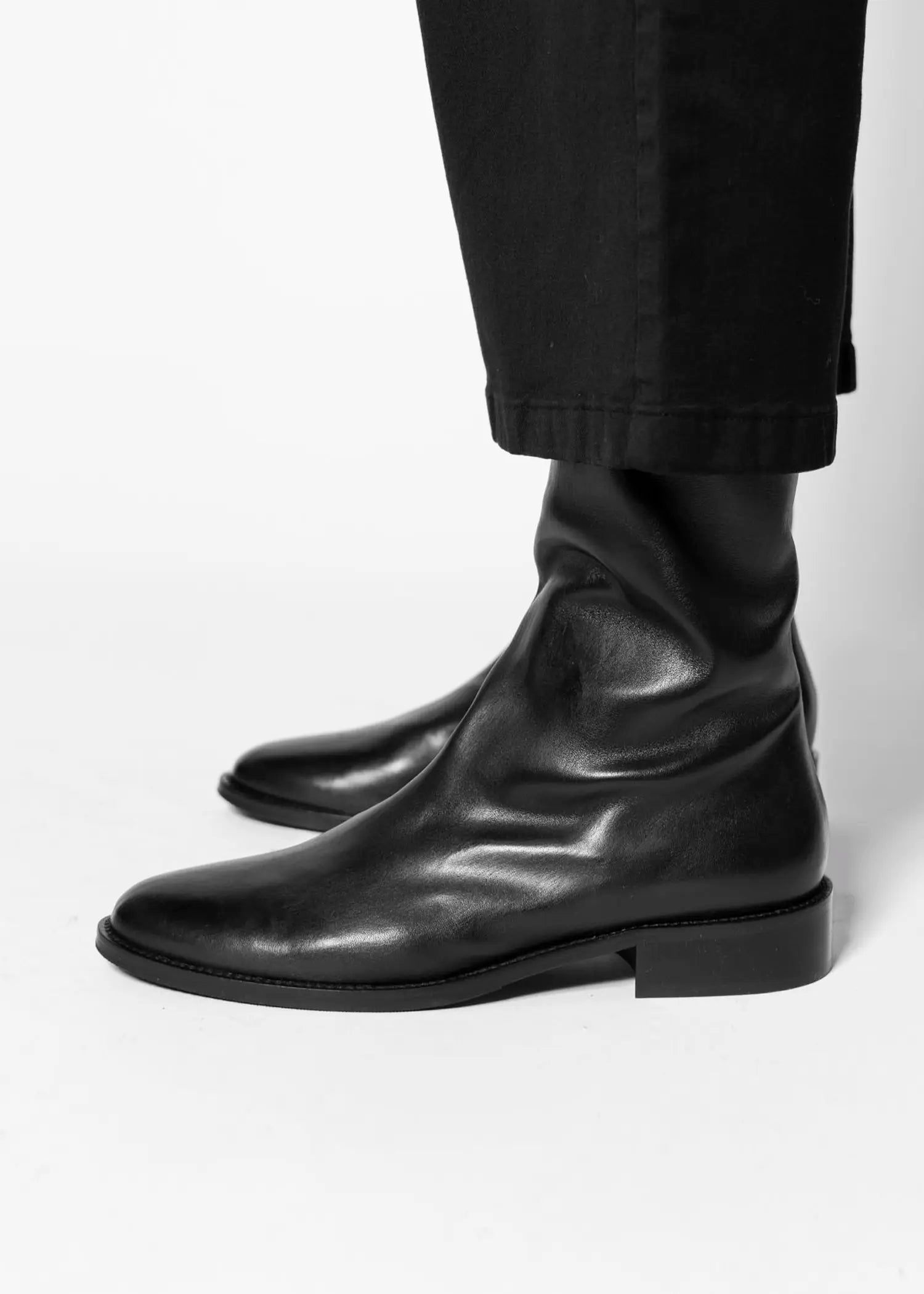 swatch_Black Leather pull on leather bootie shoes