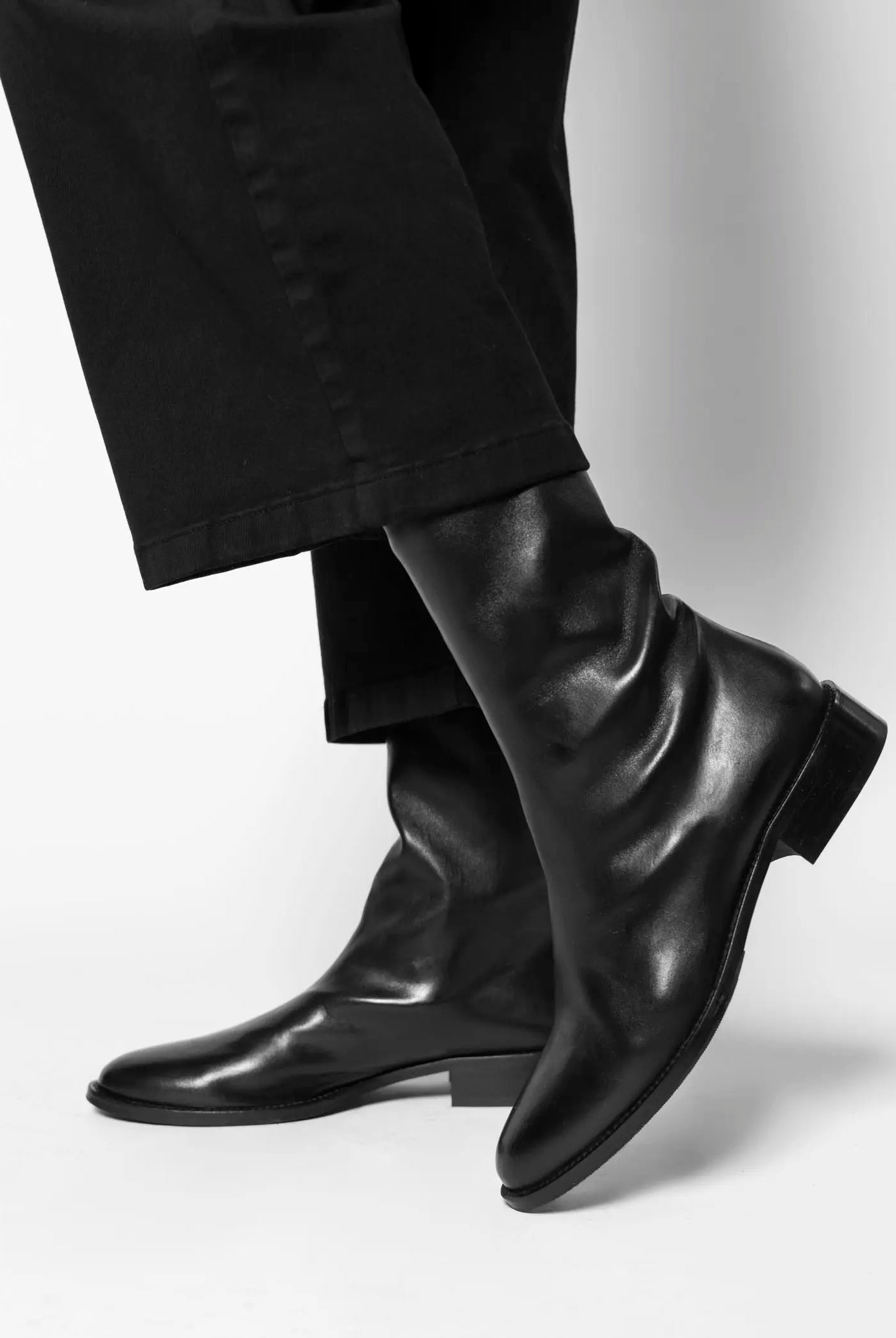 swatch_Black Leather pull on leather bootie shoes