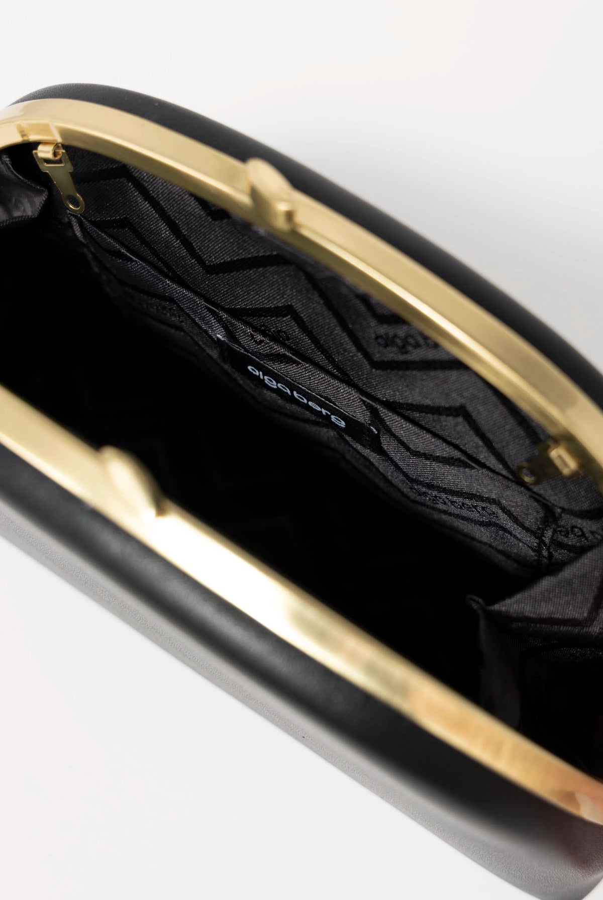 swatch_Black olga berg celeste curved clutch