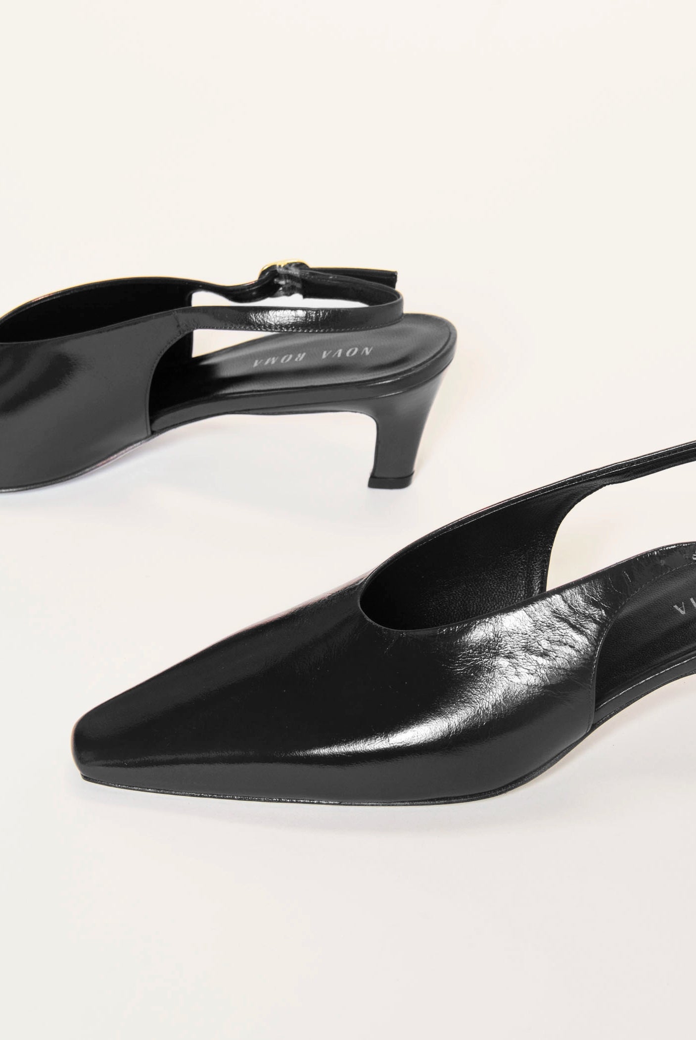 swatch_Black Patent slingback pump shoes